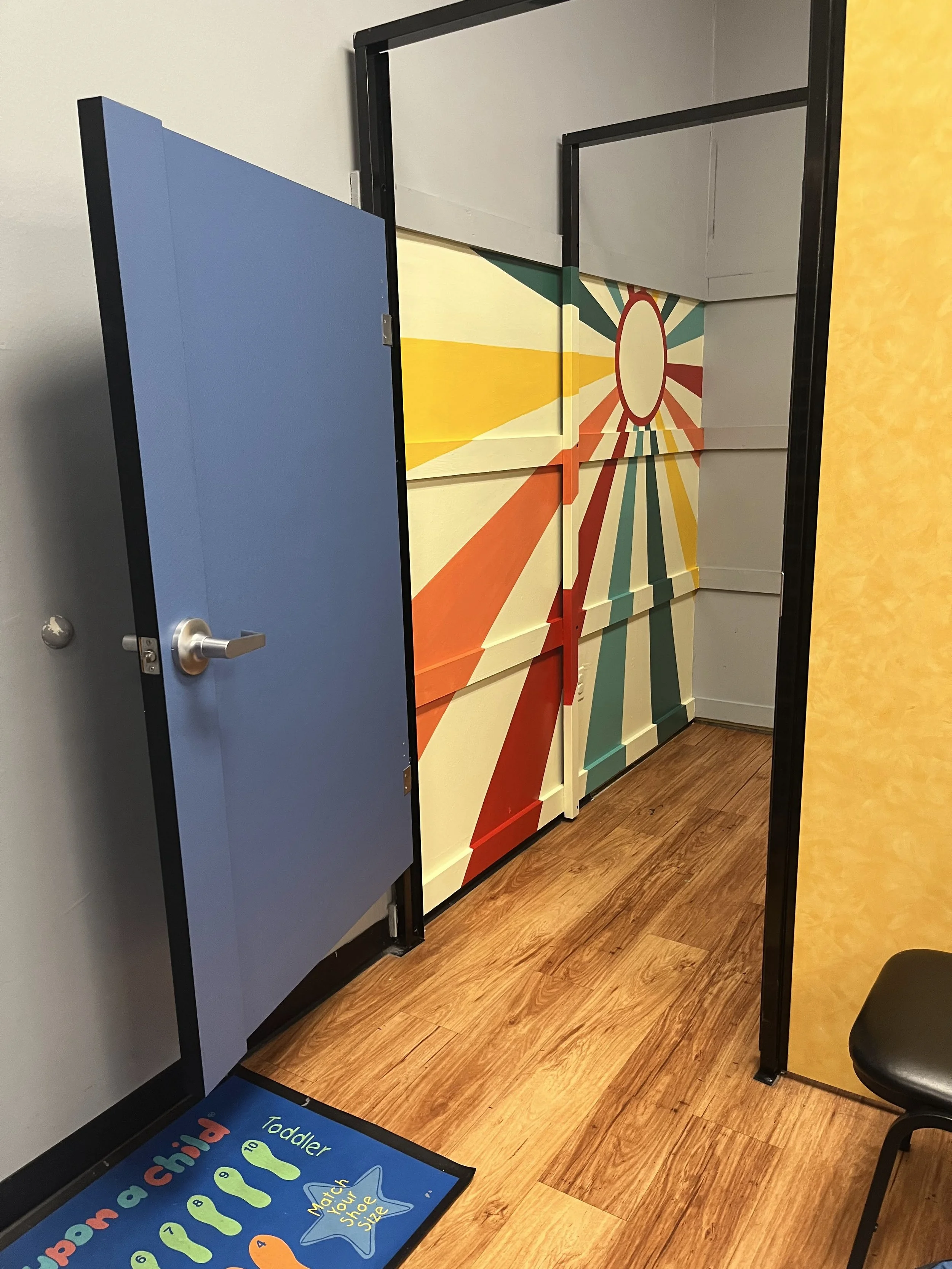 Changing room mural at Once Upon a Child in Baton Rouge