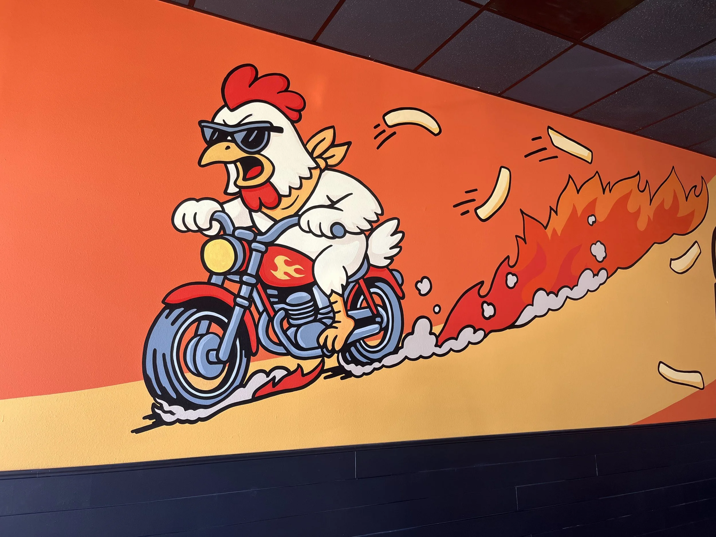 Chicken on a motorcycle mural for Geaux Philly in Hammons