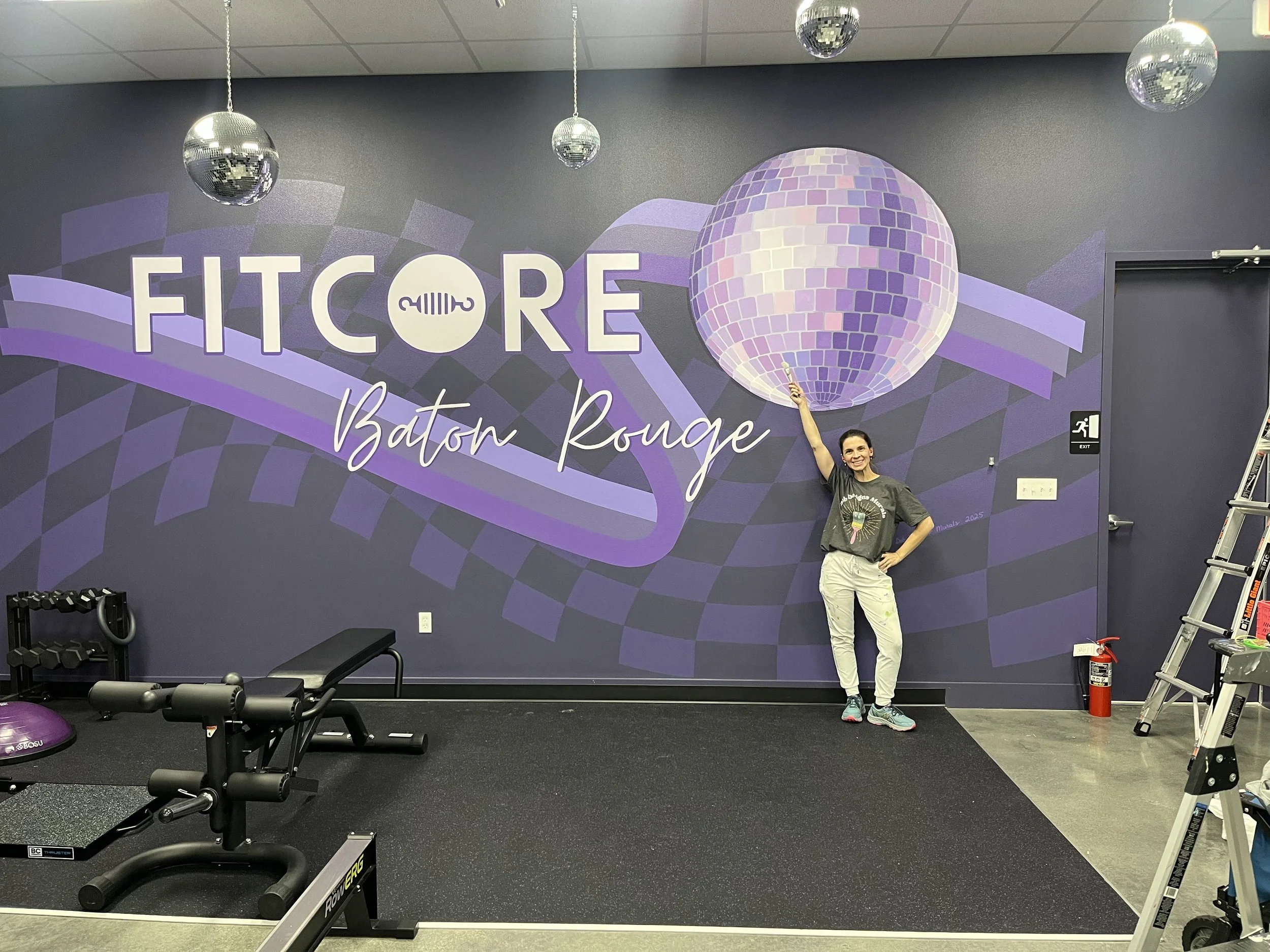 Fitcore disco ball mural incorporating logo
