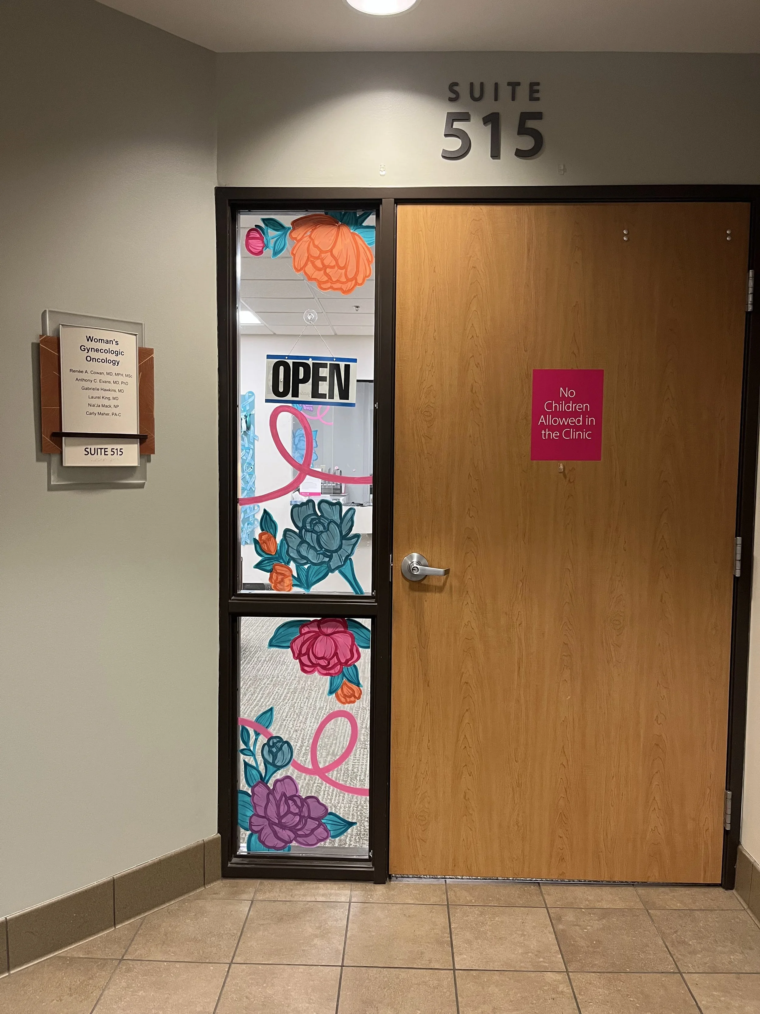 Interior window mural for breast cancer awareness month at Woman’s Hospital. Painted on removal vinyl clings