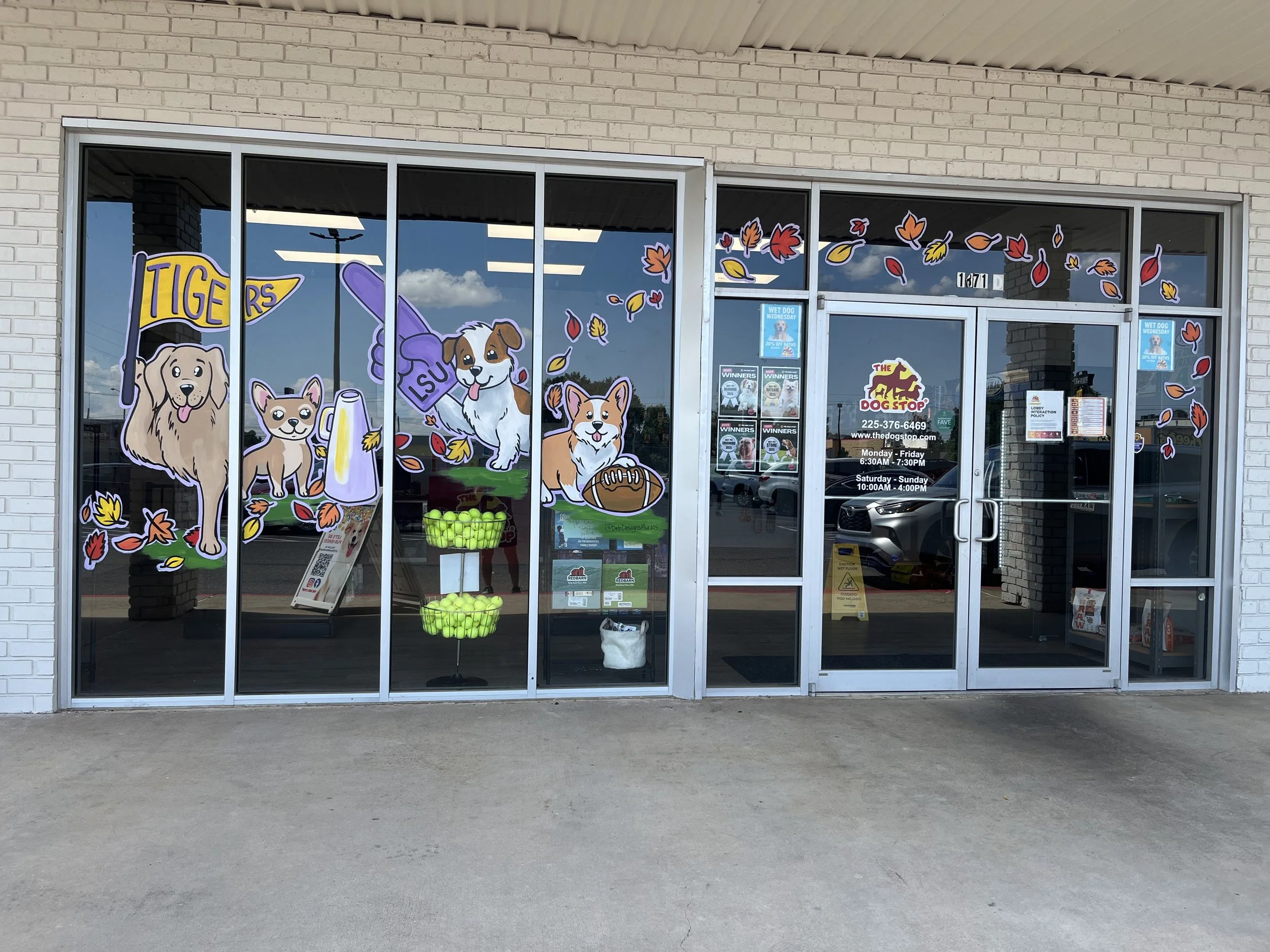 Fall window design for The Dog Stop in Baton Rouge