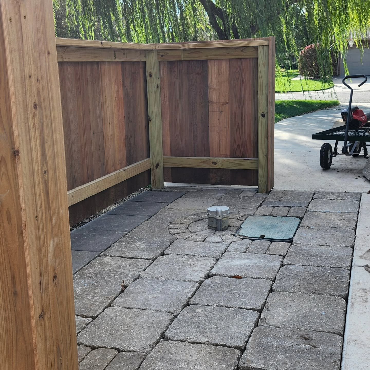 Just realized I hadn't posted since earlier in the summer. Time sure flies when you're doing something you love. We built this fence and laid the pavers this week to tidy up this side of the home. If you're thinking about having stone work or hardsca