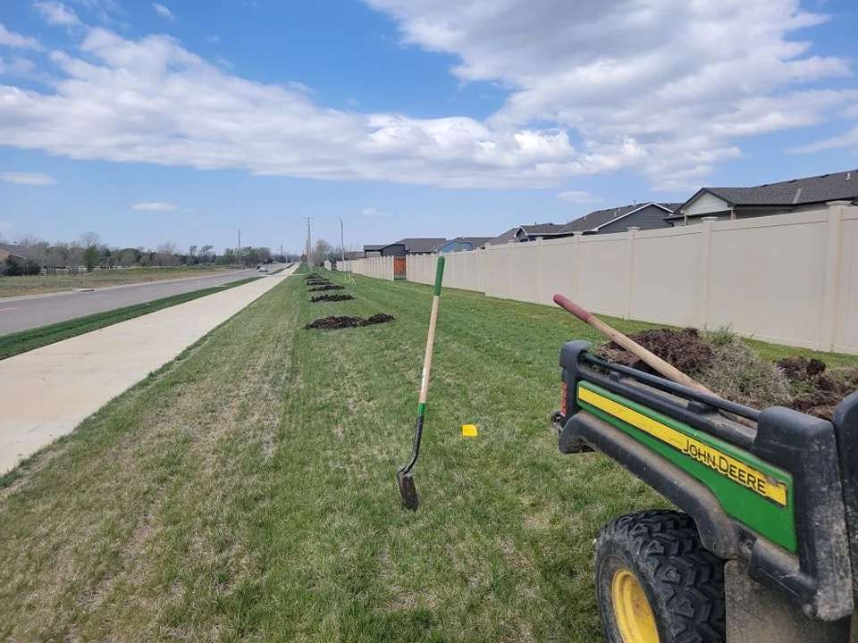 Dug the holes for trees in Andover today and that's about all that was done with this wind. 
#landscaping #plantatree #wichitalandscaper