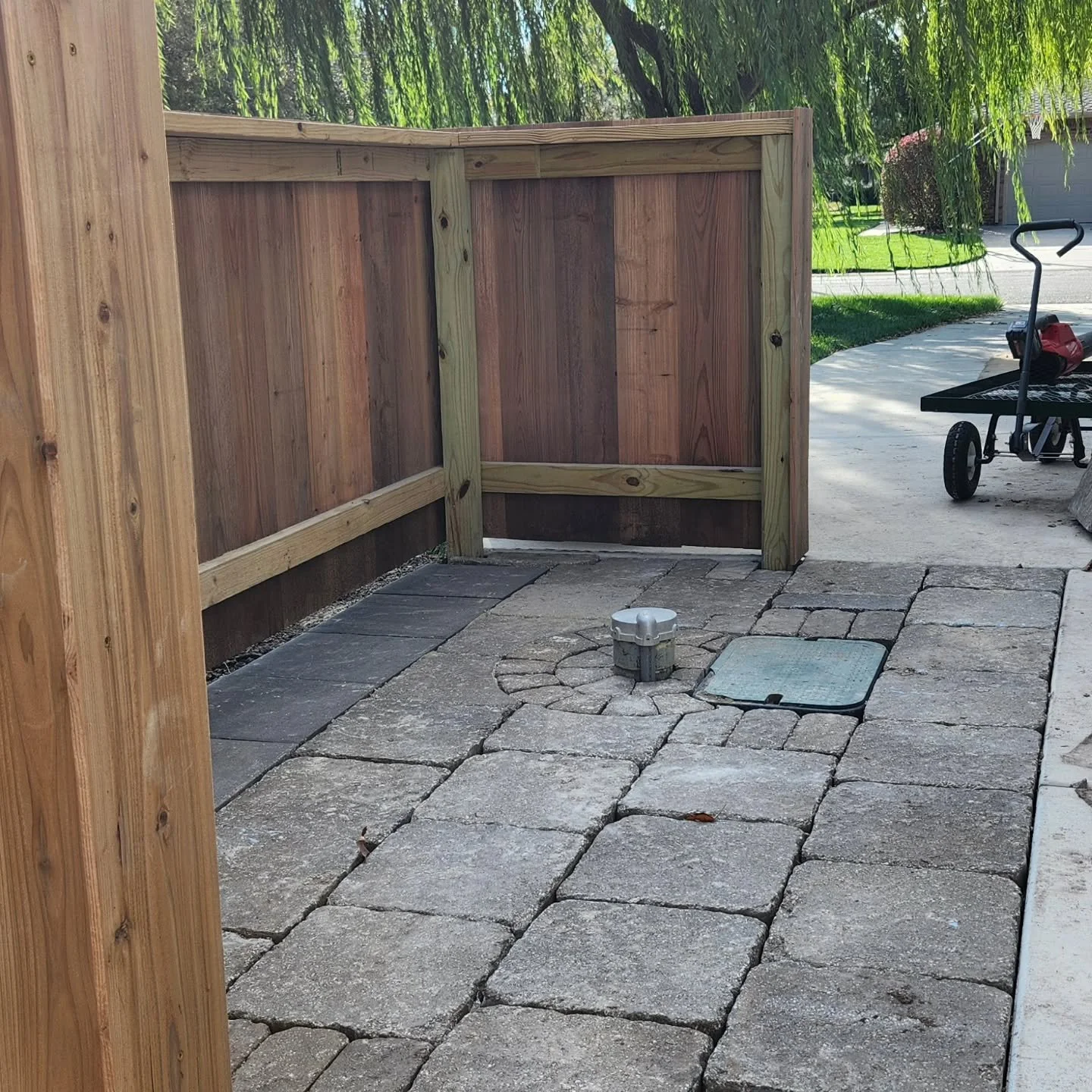 Just realized I hadn't posted since earlier in the summer. Time sure flies when you're doing something you love. We built this fence and laid the pavers this week to tidy up this side of the home. If you're thinking about having stone work or hardsca