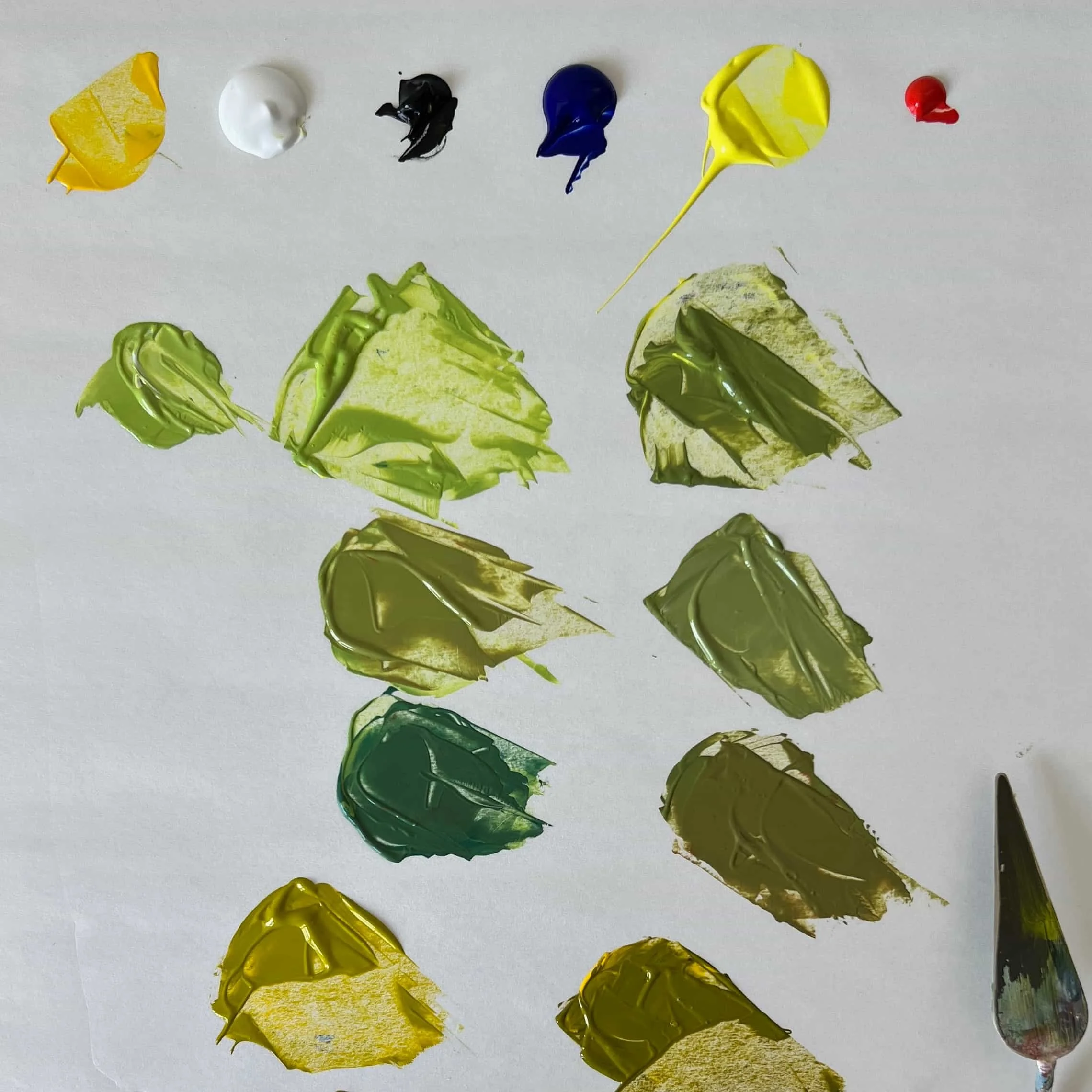 a variety of green hues mixed from yellow, black and blue