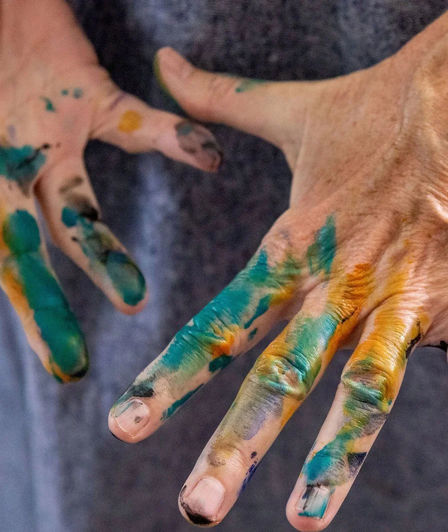 image of hands covered in paint