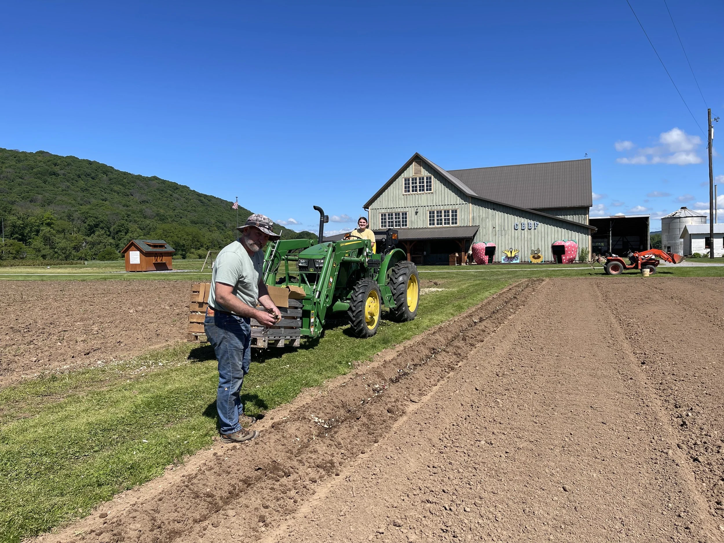 Jarod and Margot preparing the garden.