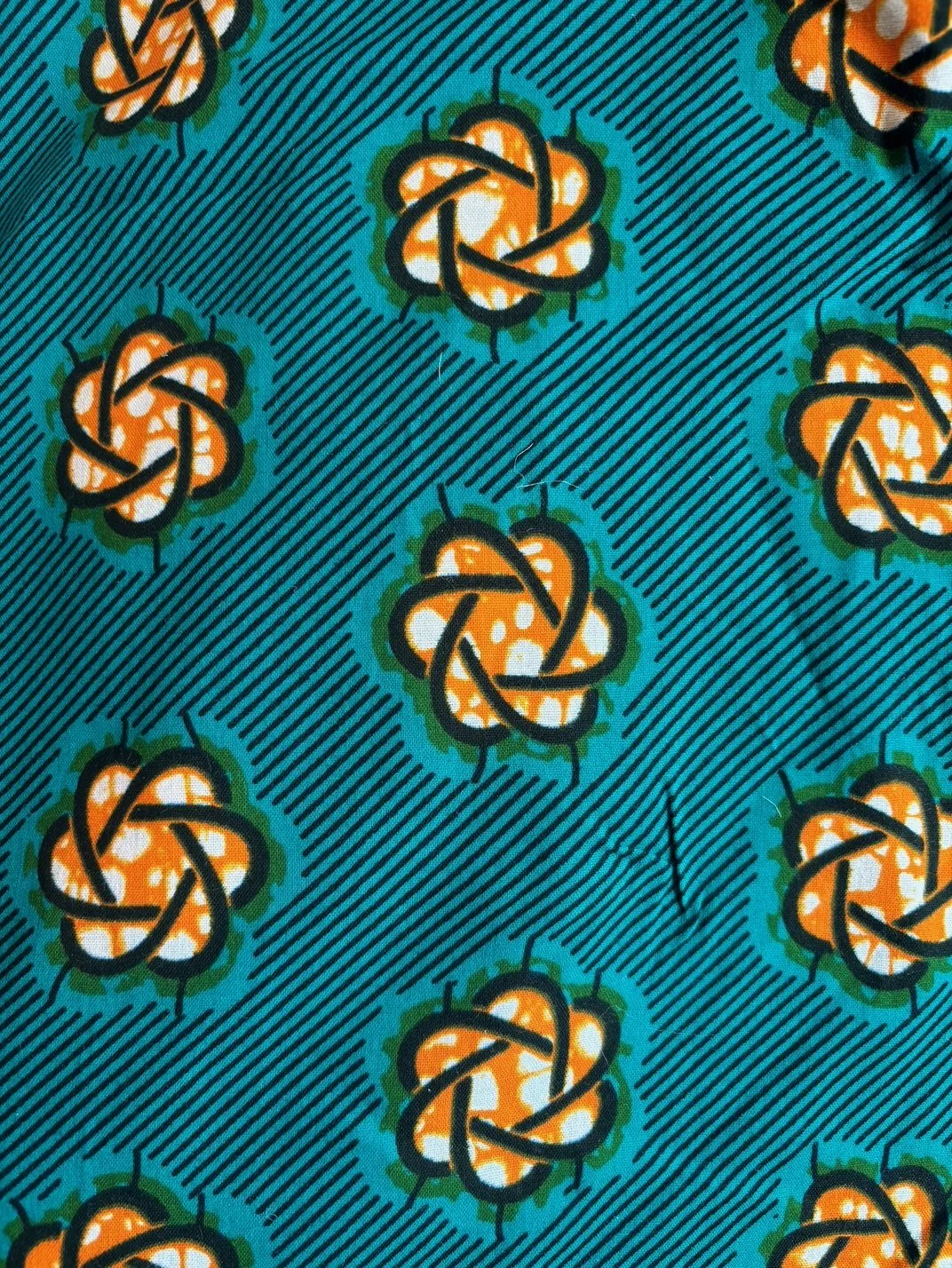 Fleurs, lagon et orange
