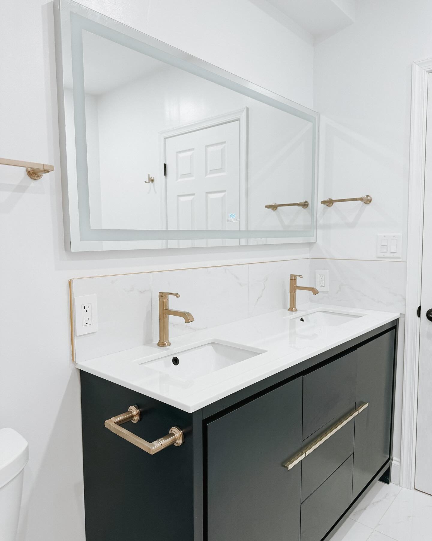 Some more amazing work done by the team this week! Scroll to see the before pictures!
This client wanted a modern bathroom. They took their outdated bathroom and made it into a masterpiece! They will be installing glass for the shower this week to