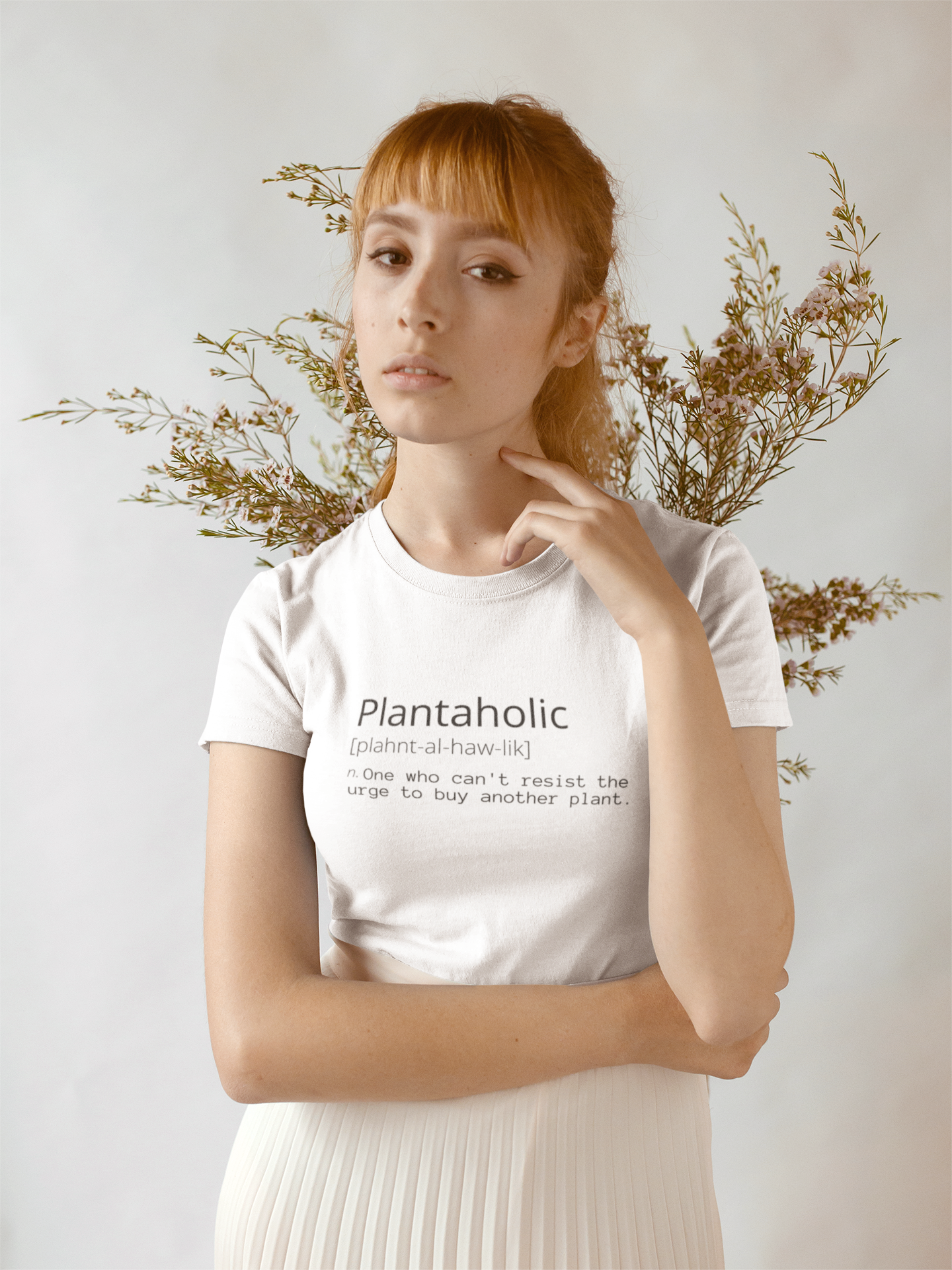 t-shirt-mockup-of-a-serious-woman-against-dried-plants-18382.png