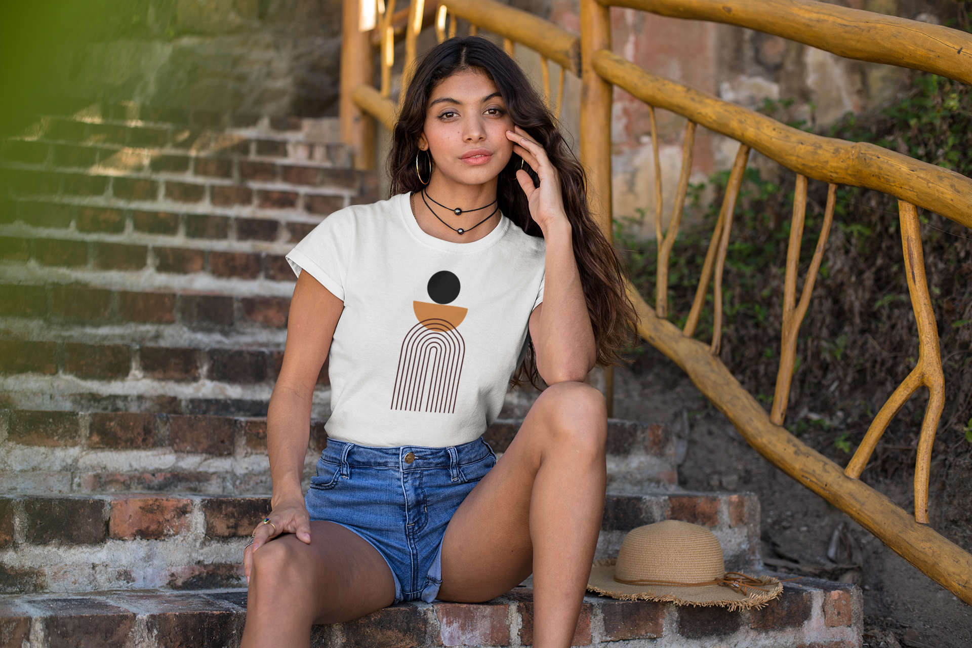 tee-mockup-of-a-gorgeous-woman-sitting-in-a-rustic-stairway-26812.png