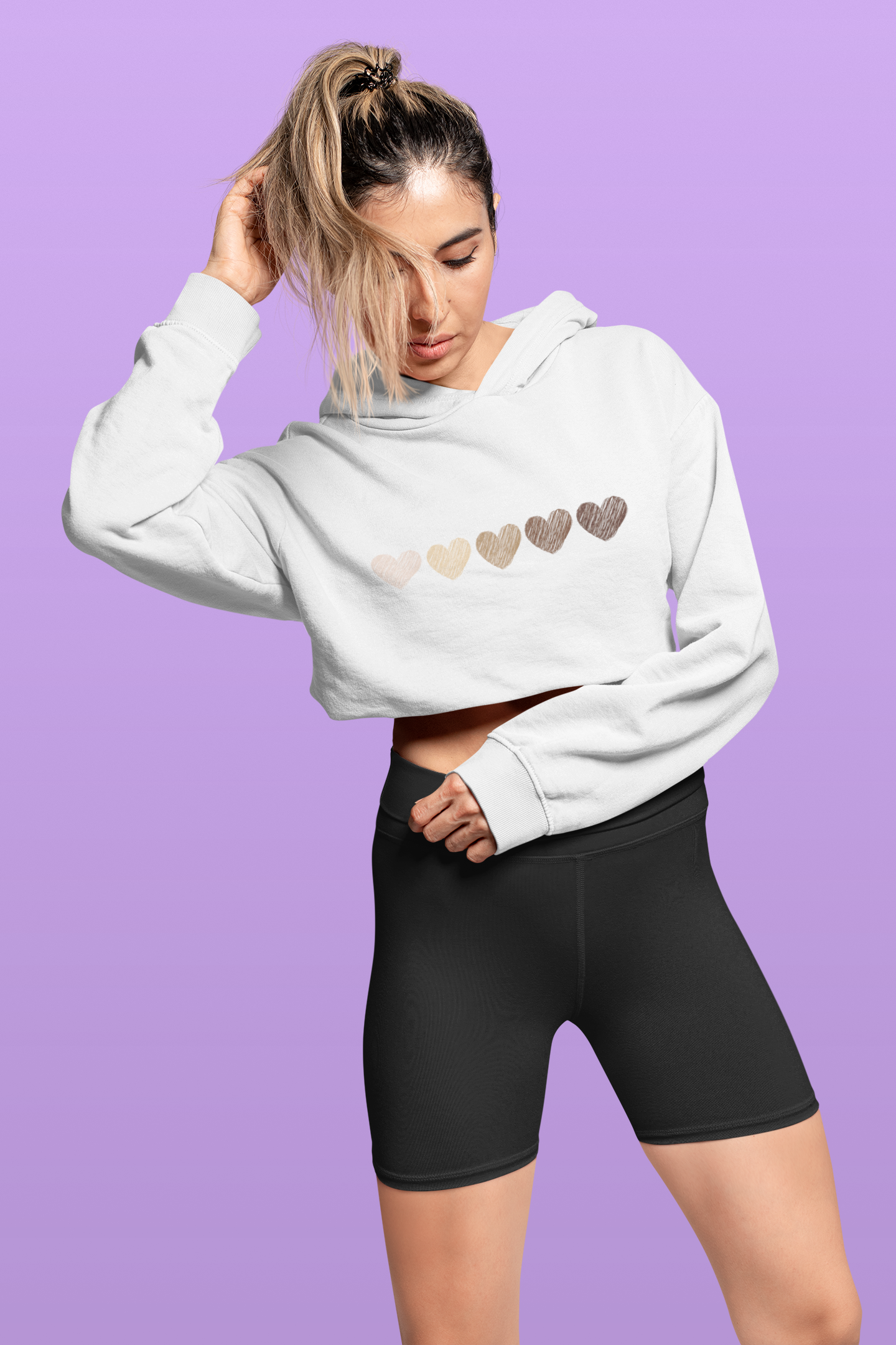 crop-top-hoodie-and-bike-shorts-mockup-featuring-a-woman-posing-in-a-studio-42356.png