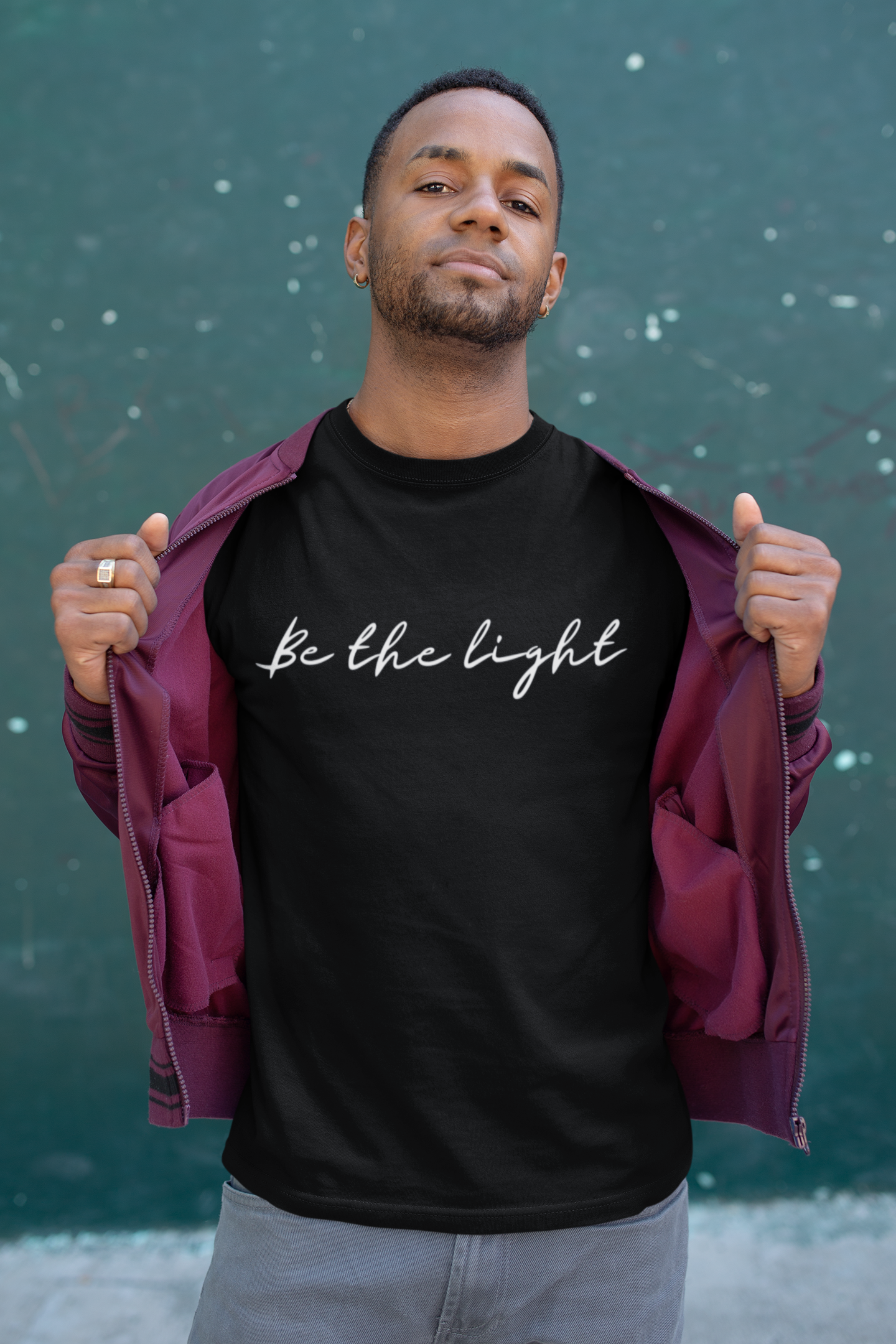 mockup-of-a-man-revealing-his-tee-from-under-a-light-jacket-25928.png