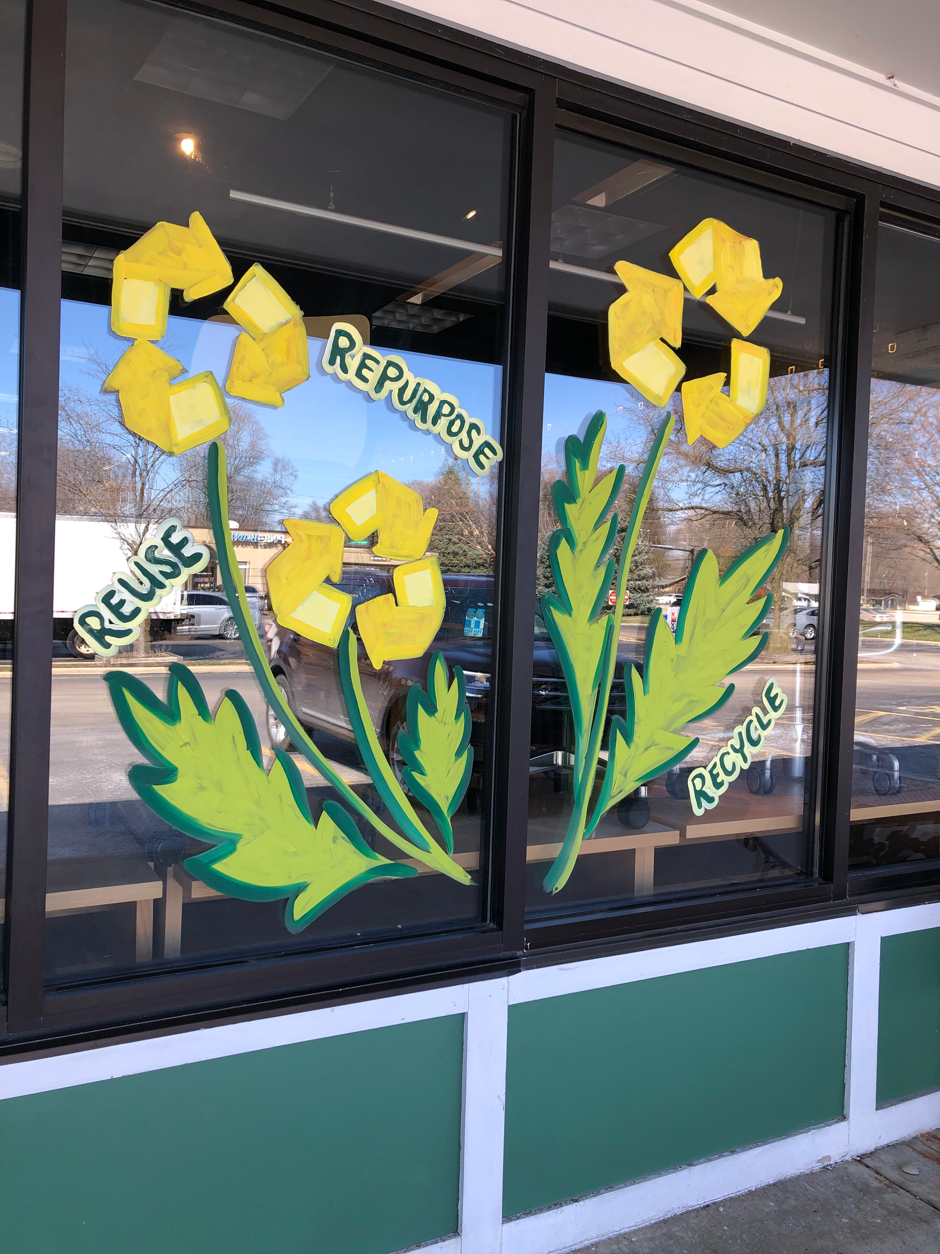 Window painting at Seating and More in Champaign Illinois by Leslie Kimble Art
