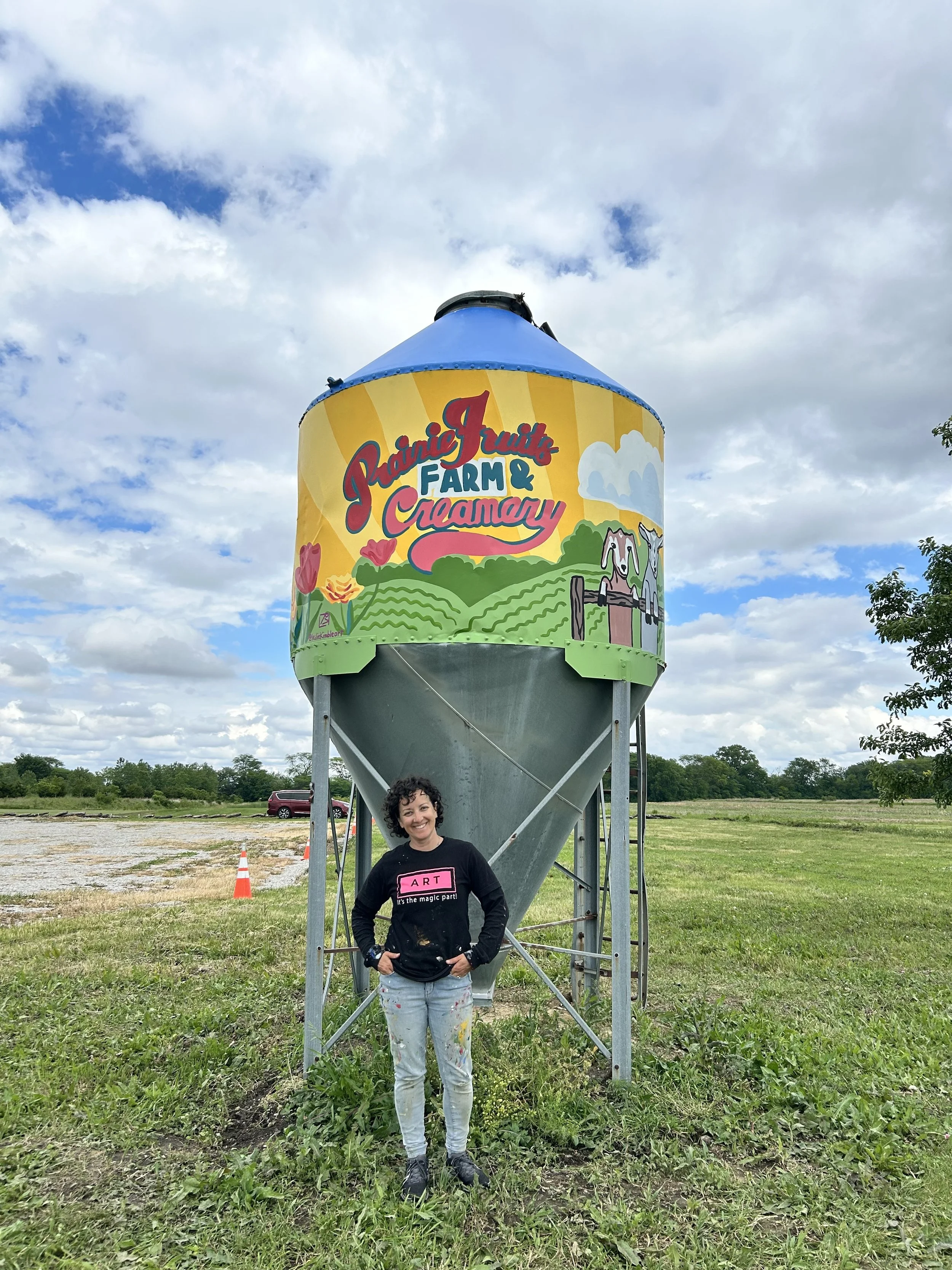 Leslie Kimble with Silo mural at Prairie Fruits Farm and Creamery in Champaign, Illinois
