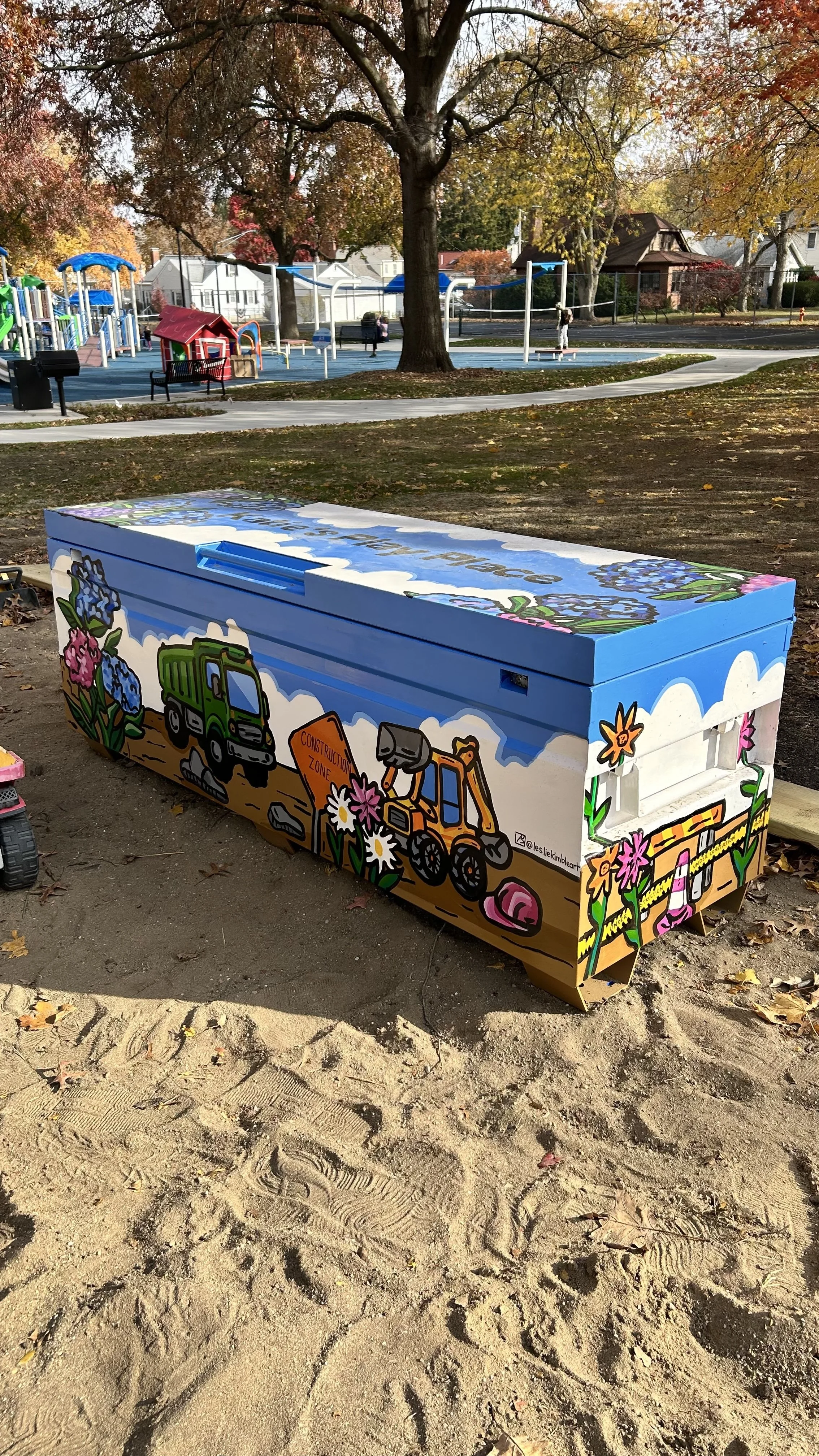 Finished toy box mural at Katies Play Place in Clark Park in Champaign, Illinois