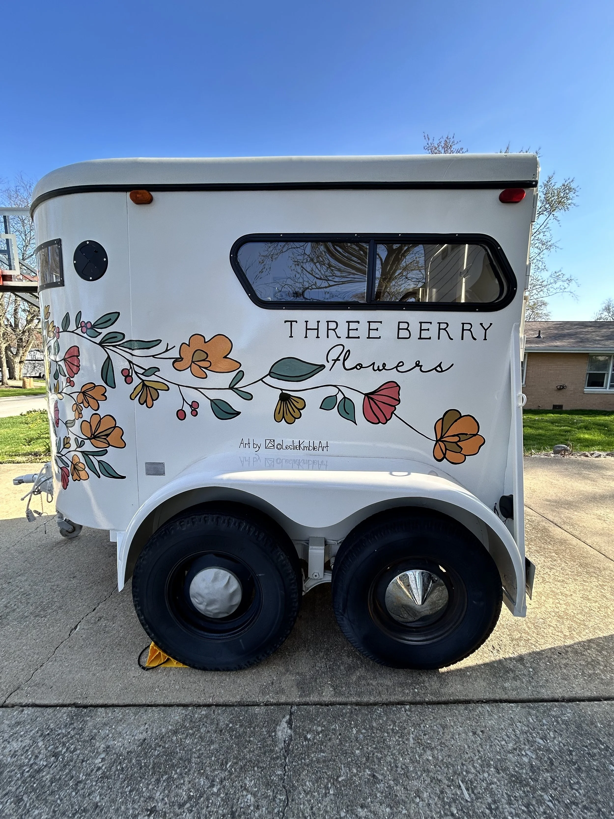 Hand painted flower trailer converted from horse trailer by Leslie Kimble, Champaign, Illinois