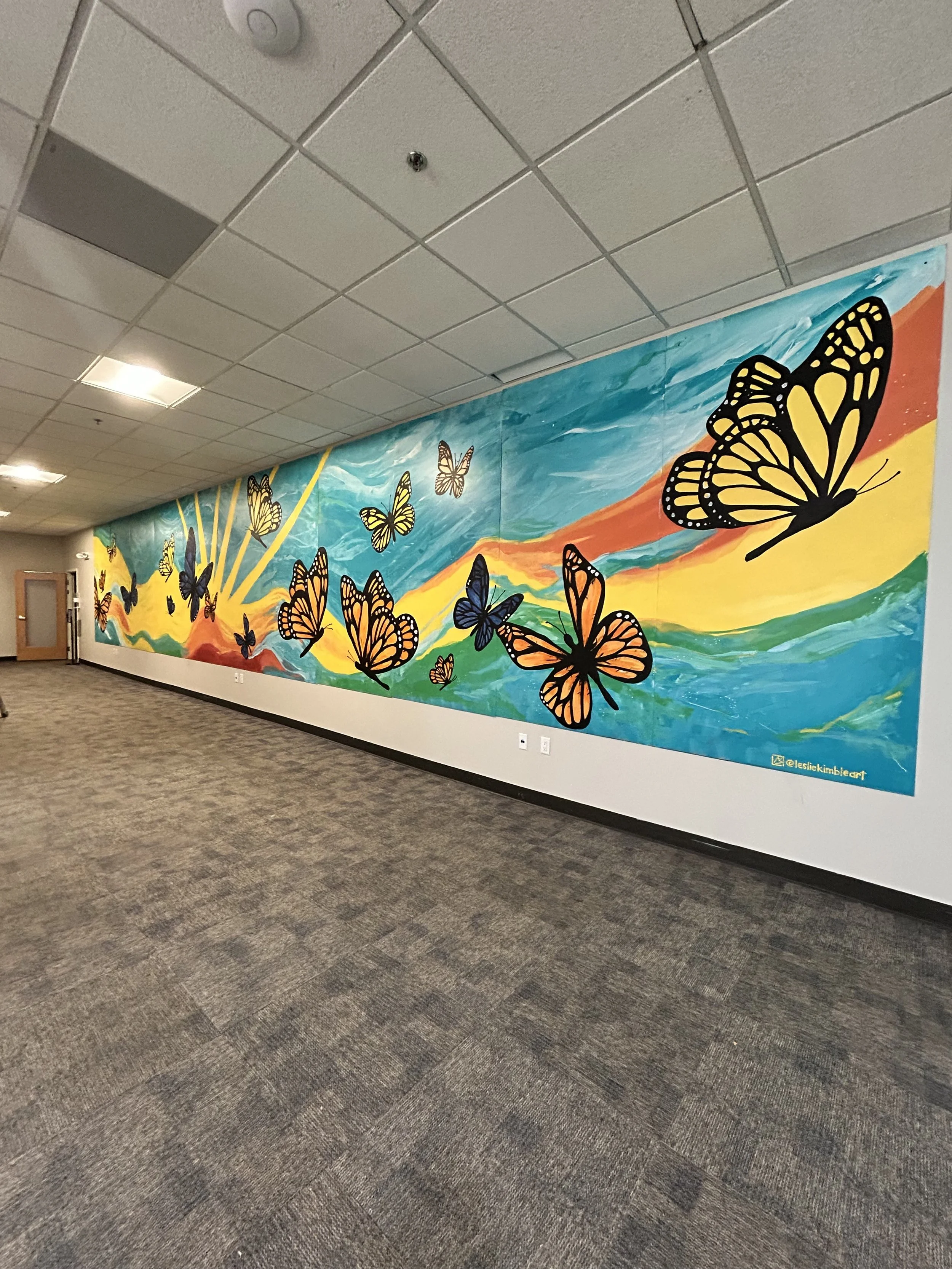 "Transformations" mural in R.A.C.E.S at Lincon Square Mall, Urbana, Illinois