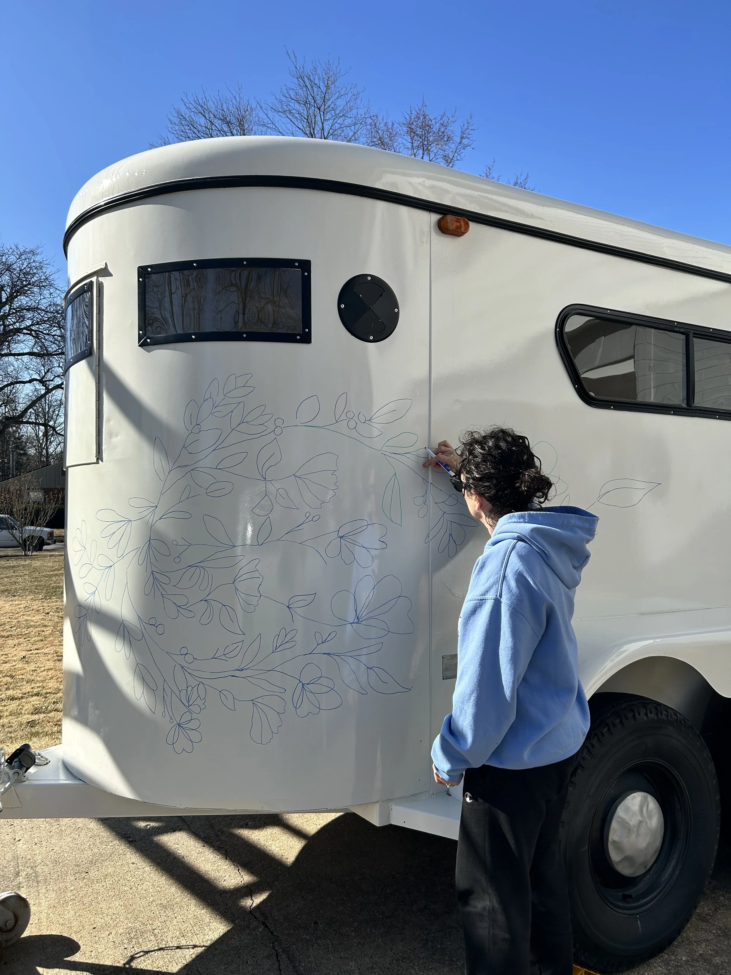 Process work by Leslie Kimble on flower trailer mural
