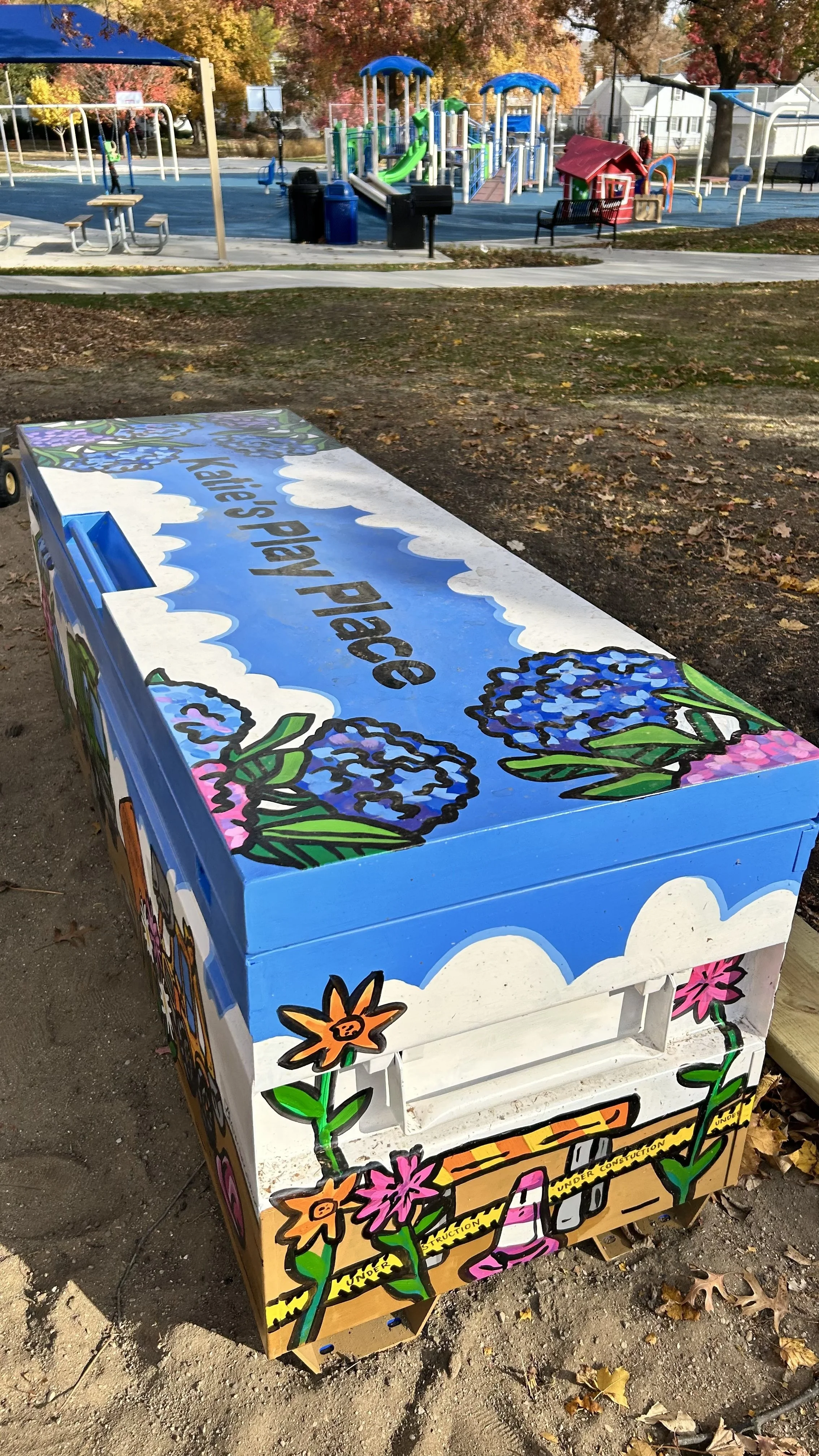 Finished toy box mural at Katies Play Place in Clark Park in Champaign, Illinois