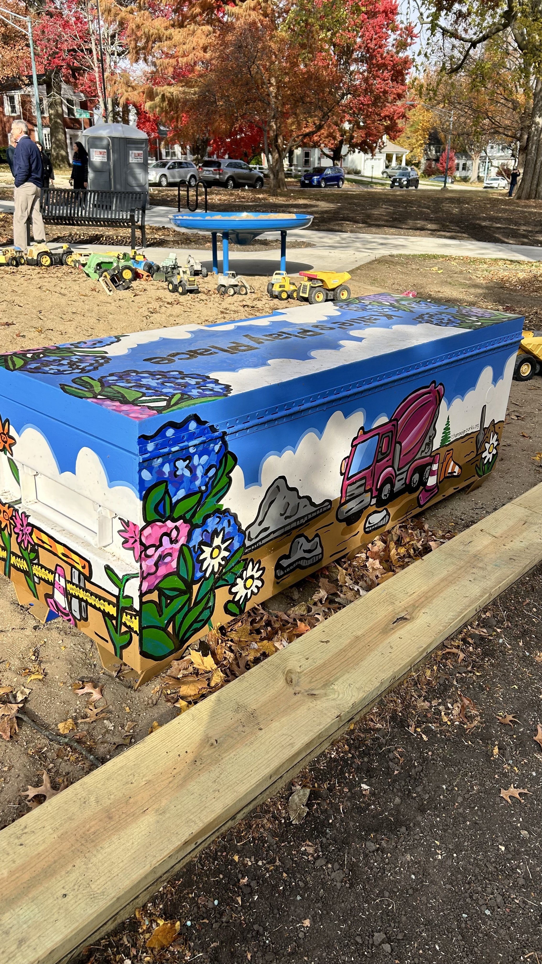 Finished toy box mural at Katies Play Place in Clark Park in Champaign, Illinois for Champaign Park District by Leslie Kimble Art
