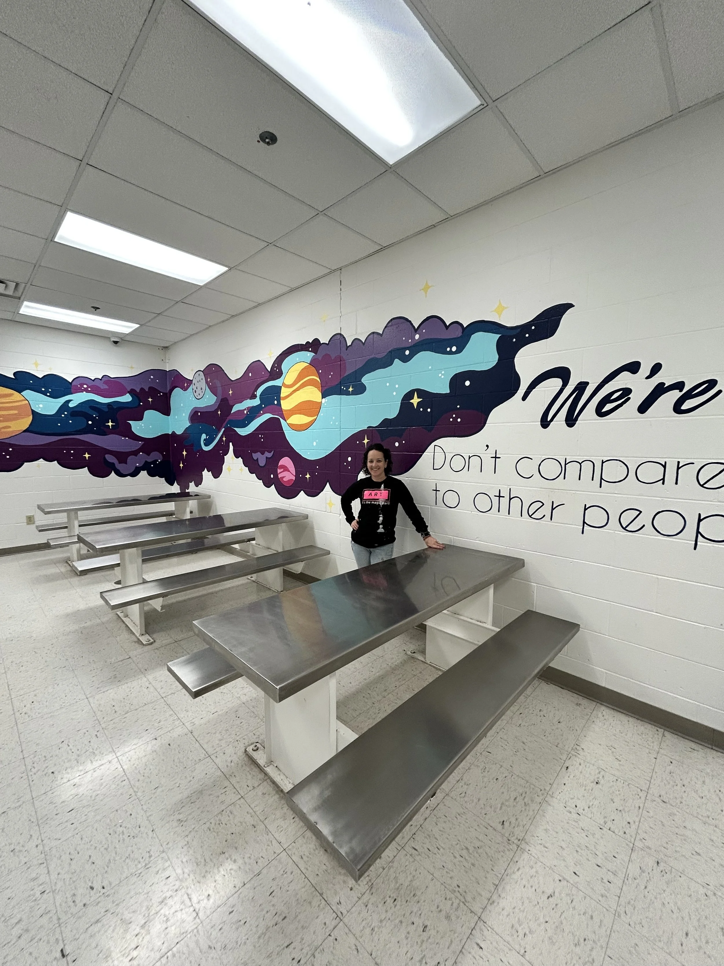 Don't Compare is a mural in the juvenile detention center in Champaign County in Illinois by Leslie Kimble Art