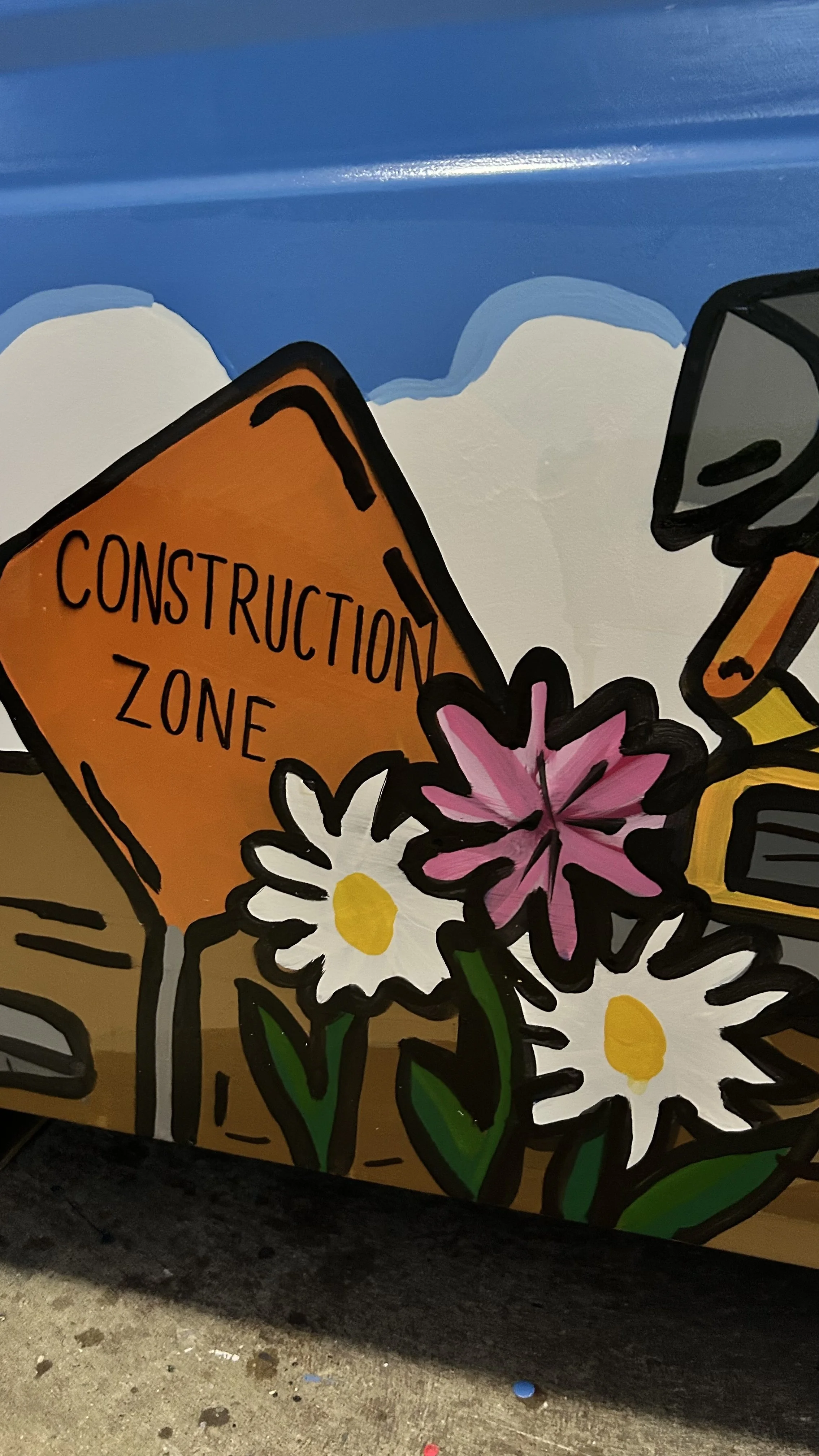 Detail flowers of toy box mural at Katies Play Place in Clark Park in Champaign, Illinois by Leslie Kimble Art