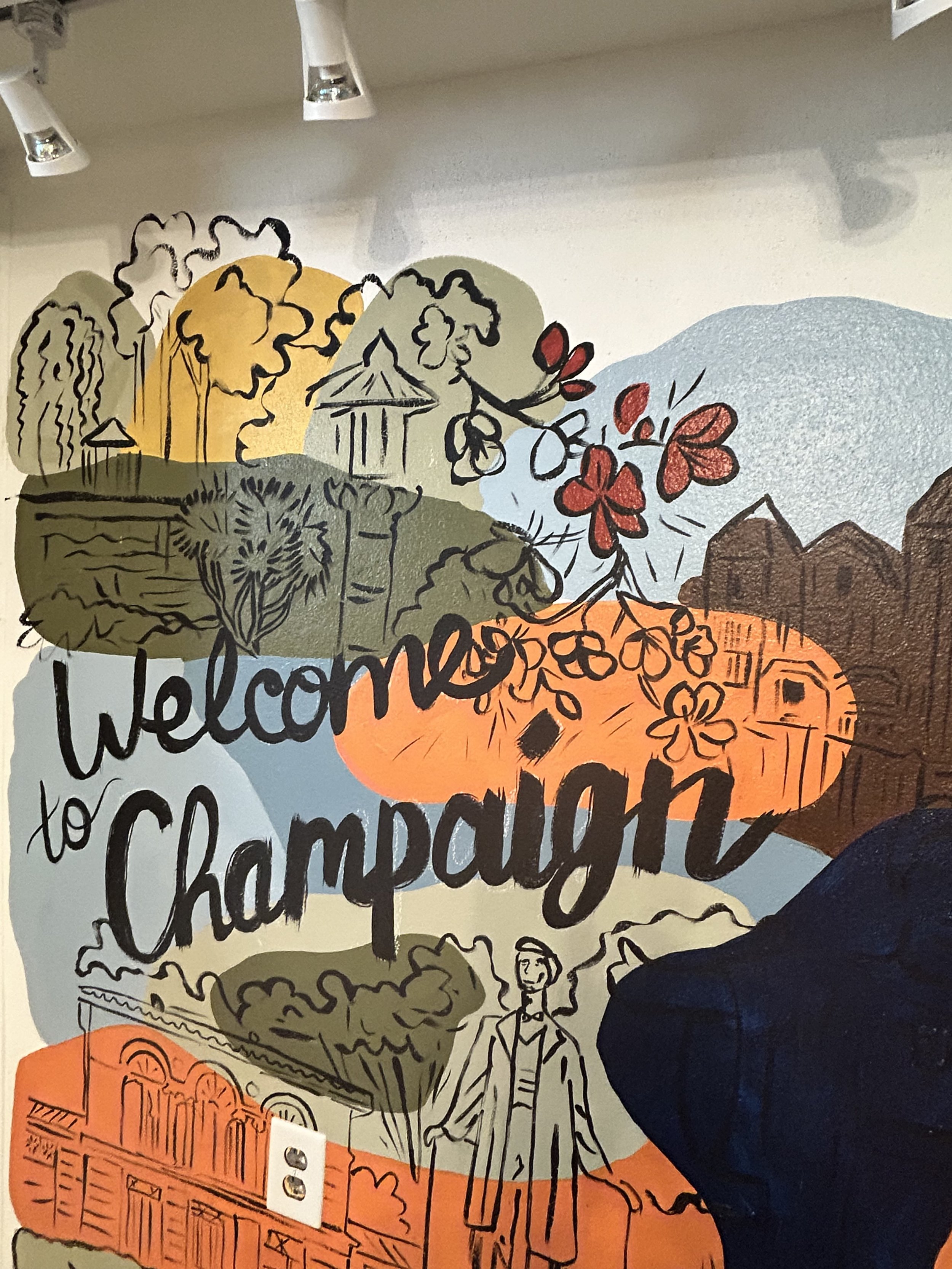 Illinois landmarks mural highlighting iconic spots in Champaign County at Airbnb in Champaign.