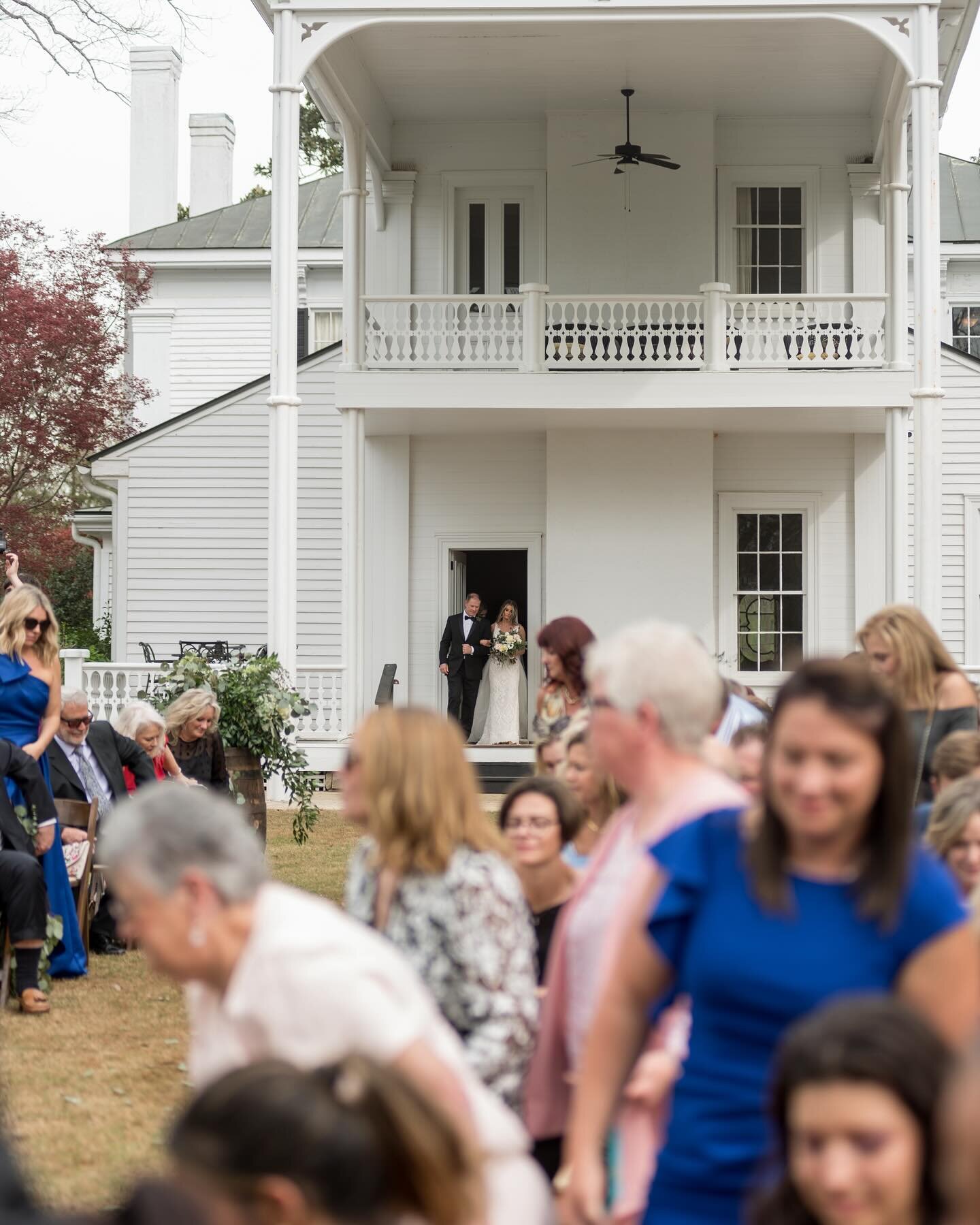 The moment when the bride emerges for her walk down the aisle. Even know she takes our breath away.

We love this aisle with a grand entrance from the back porch of the beautiful mansion at Cloverleaf Farm. There are many options for your ceremony sp