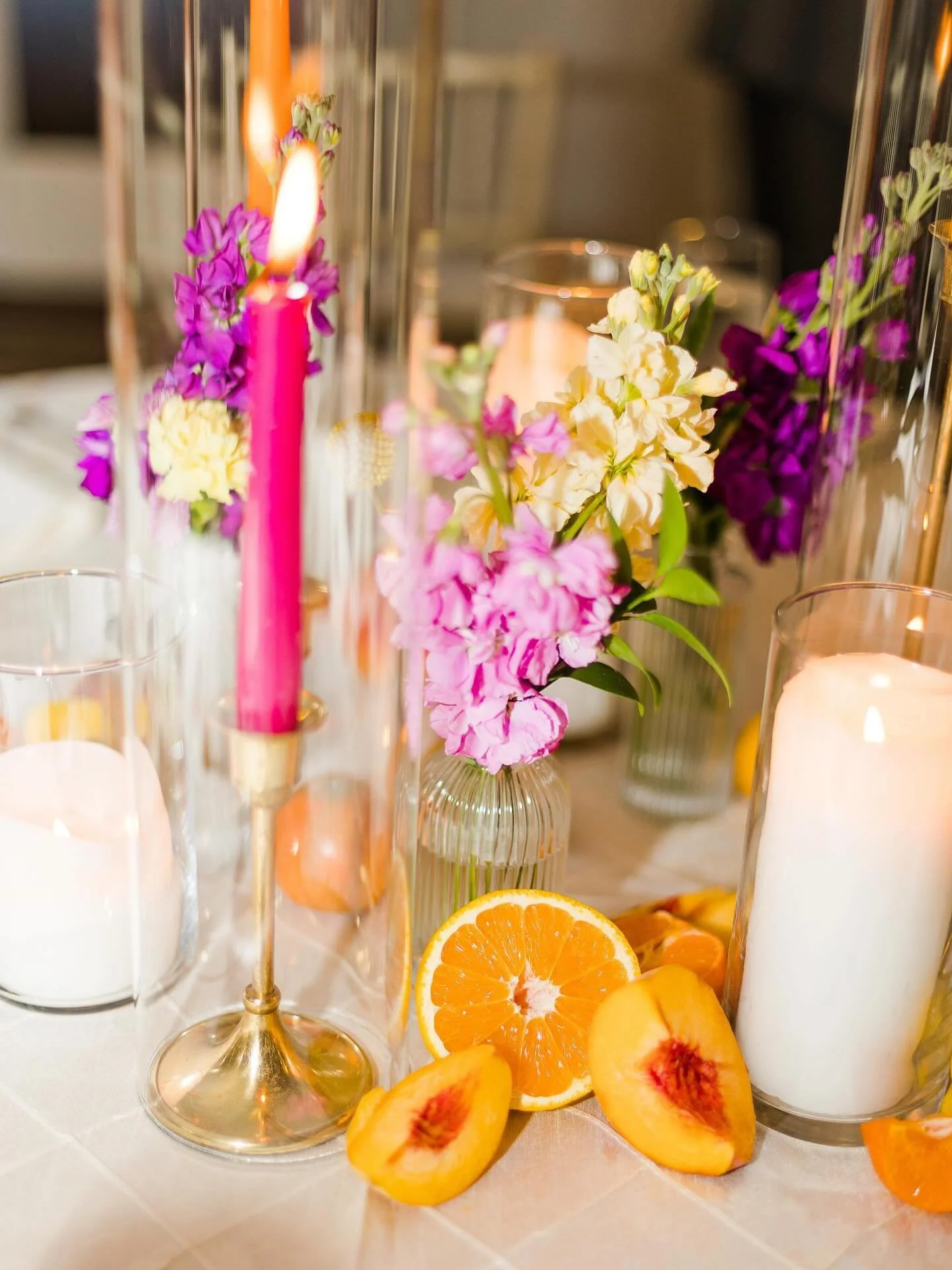 This wickedly delicious tablescape at Little Gardens—styled and catered by the creative minds at A Divine Event—brings bold color, fresh fruit, and unforgettable flavor to your dream wedding day. Who says elegance can’t be a little
