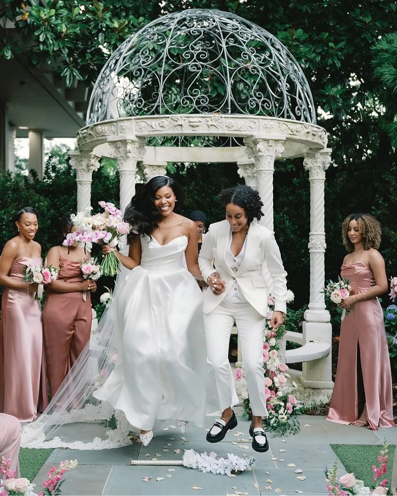 Freedom celebrated. Legacy honored. Love elevated.
On this Juneteenth, we reflect on history and embrace a future built on joy. This powerful moment—jumping the broom after saying their vows at the gorgeous gazebo in The Atrium courtyard garden