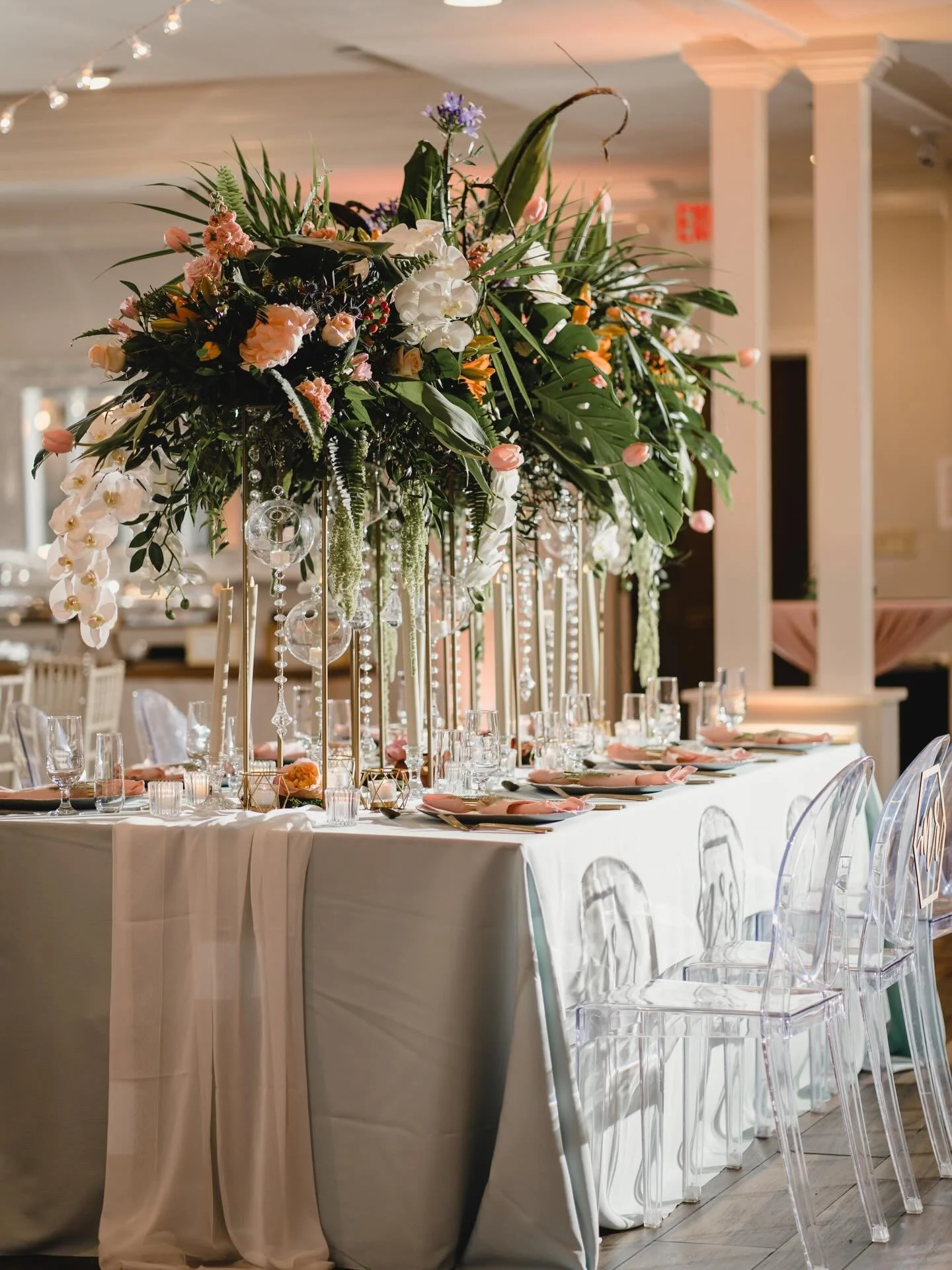 An elevated tablescape moment ✨ When Natalie House and A Divine Event collab, the result is pure wedding magic&mdash;dripping jewels, lush white florals, layers of greenery, and soft peach tones that feel effortlessly luxe. Every detail is designed t
