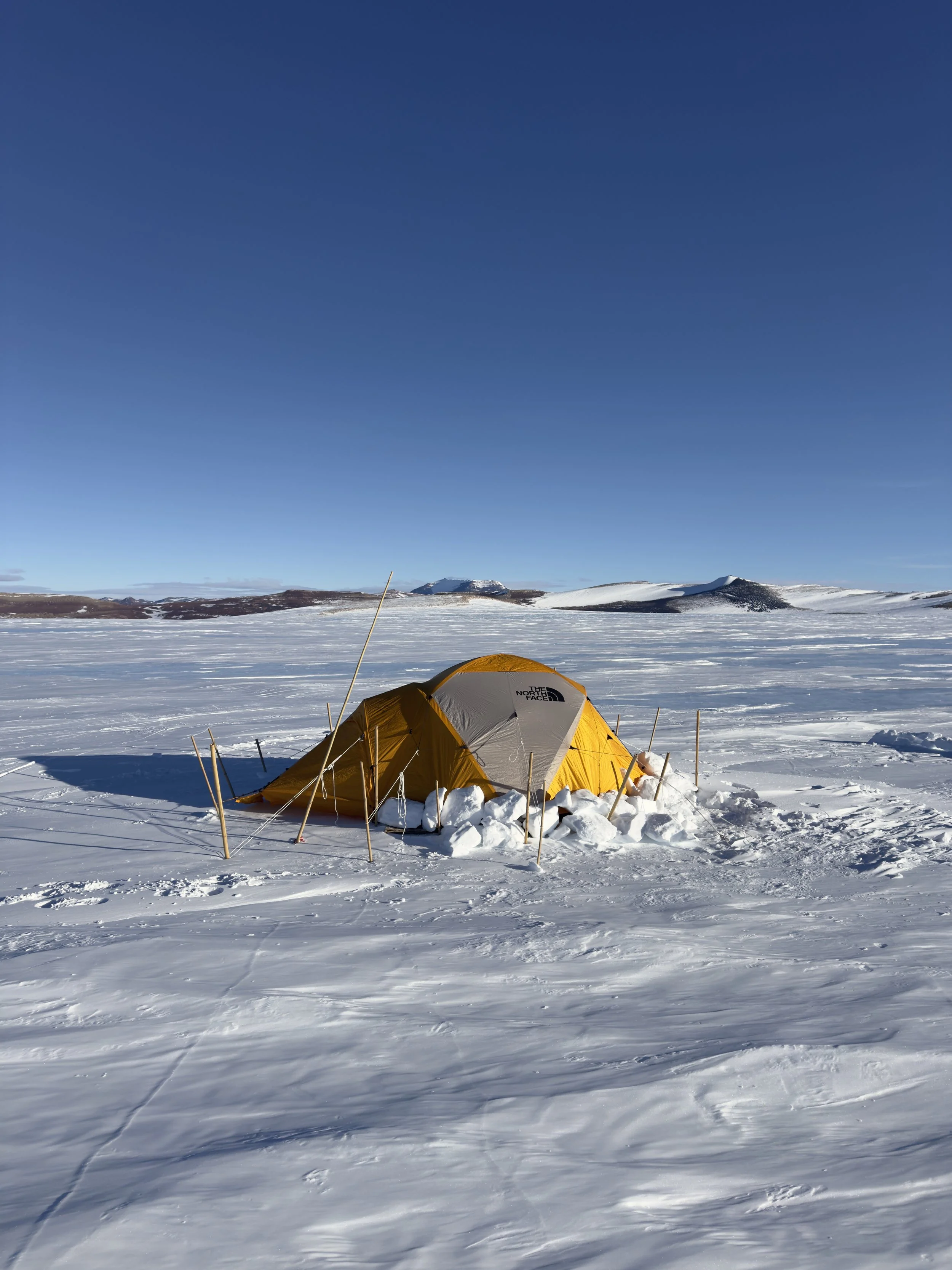   Securing our tents also means covering the valance with snow and ice to both hold the tent down during high winds and slow the inevitable creep of blown snow under the fly.  