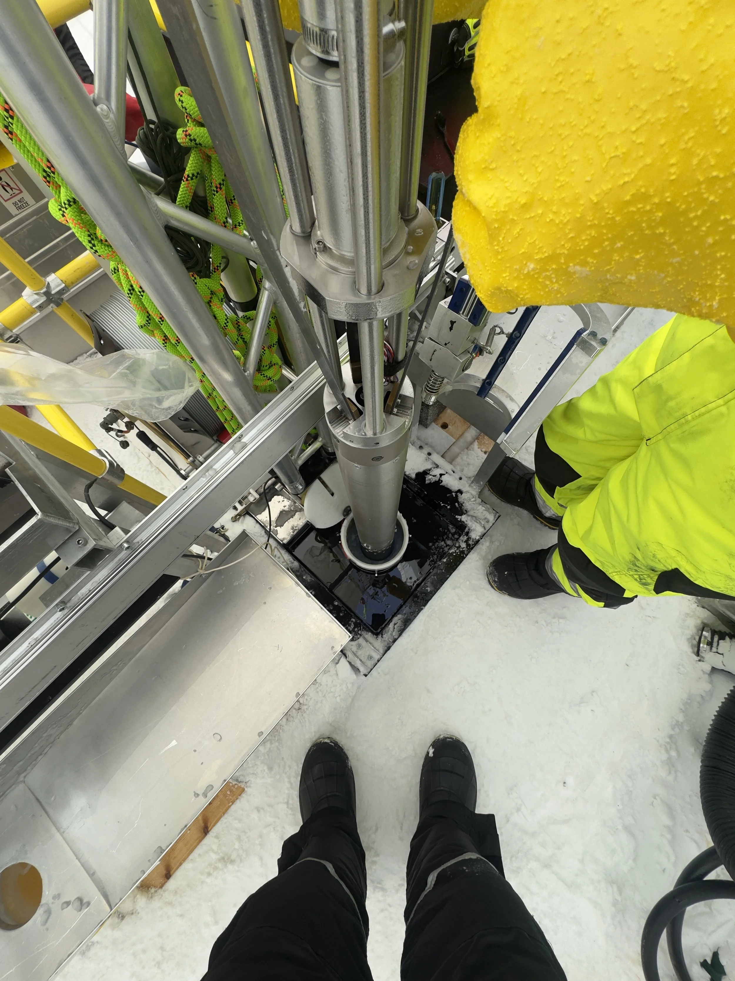   The Shallow Wet Drill going into the borehole to collect a new core.  