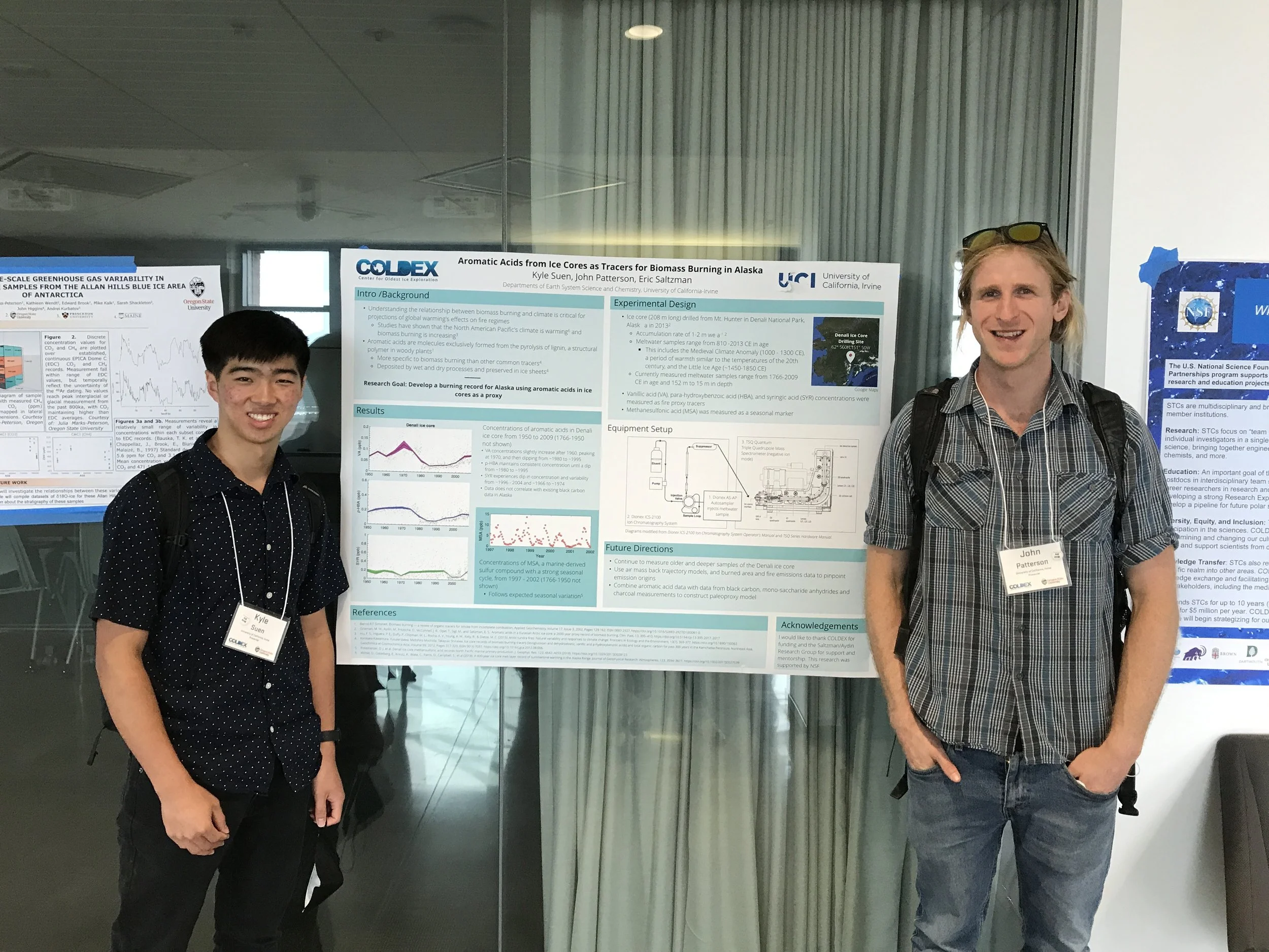 COLDEX REU student and graduate student mentor standing in front of a research poster at the annual meeting
