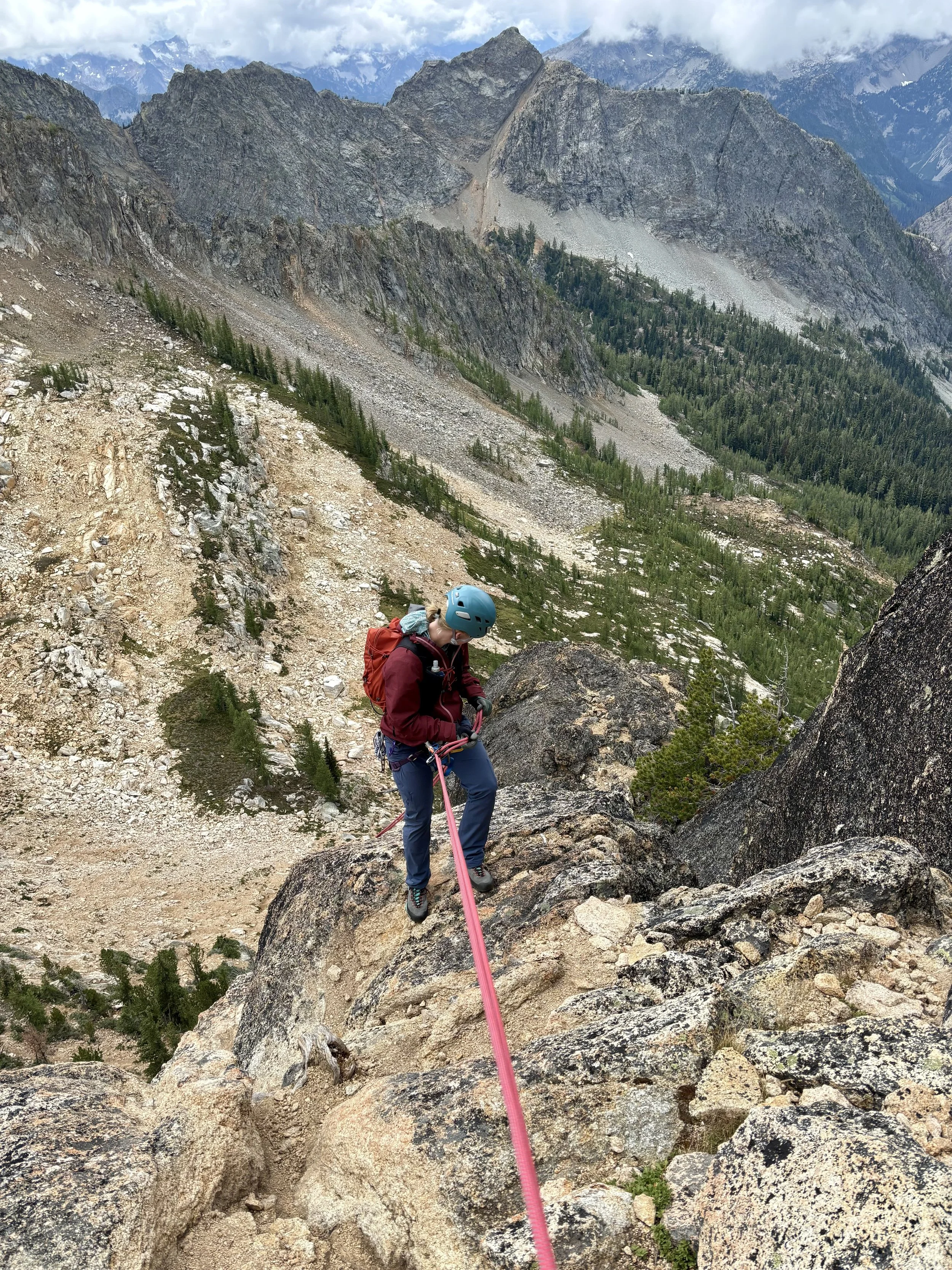 Krista rappelling the final pitch down