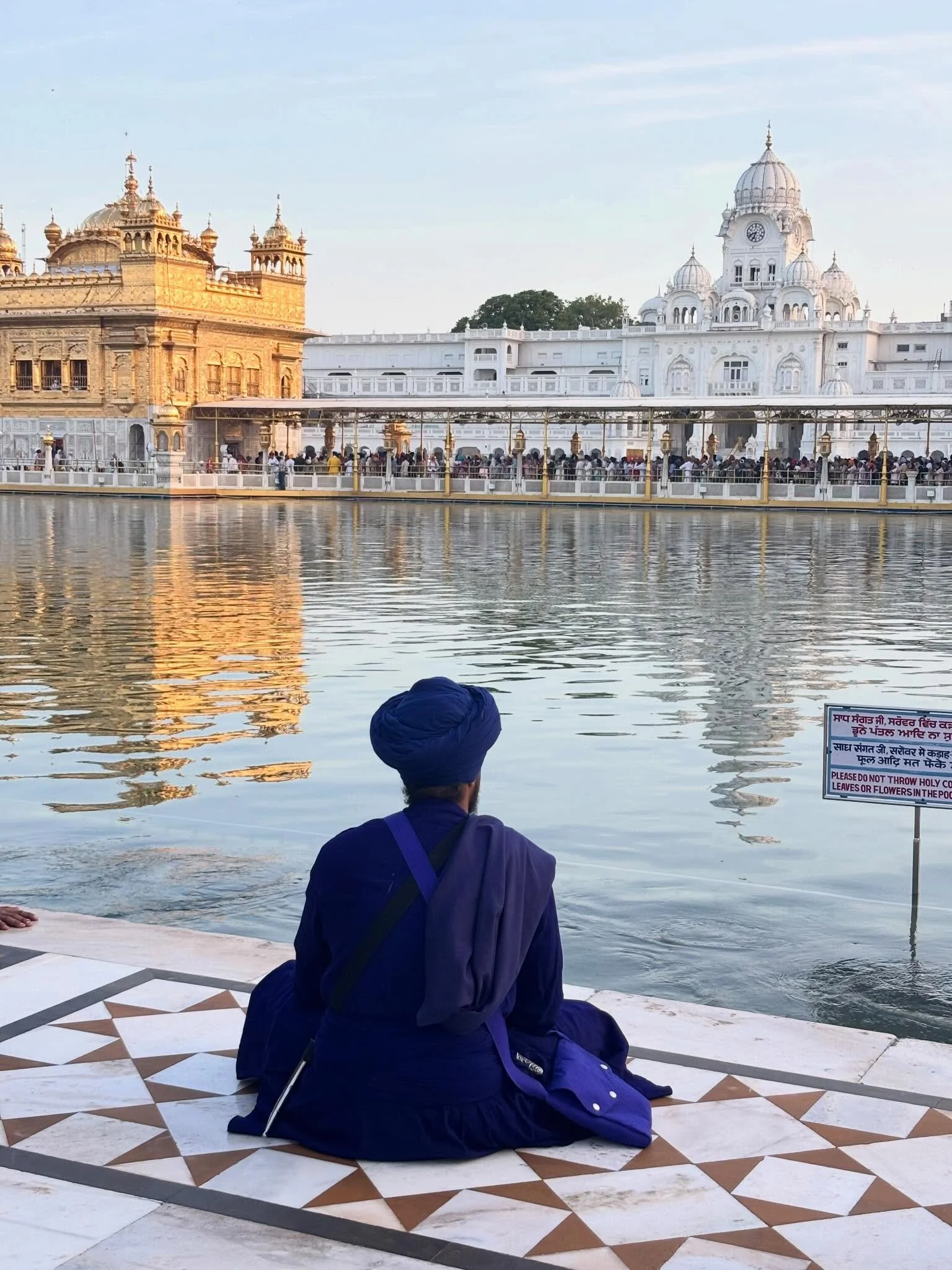 I didn&rsquo;t go to the Golden Temple as a tourist. 

I went as a nervous system.

And something inside me exhaled.

Thousands of people fed daily.
Everyone sitting on the floor, equal.
Heads covered. Shoes removed.

Safety is the foundation of love
