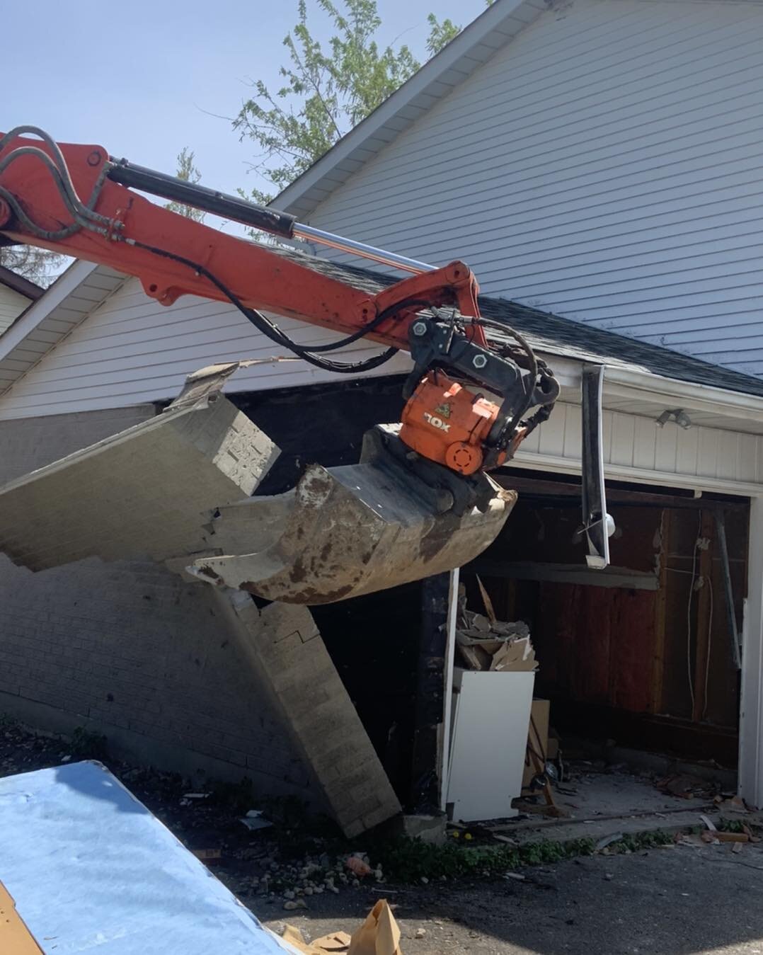 Back from vacation and hit the ground running.
Day one of an addition project in Guelph: Electrical service disconnect, re-work electrical feeds, gut a basement bathroom and kitchenette, demolish the garage.
I think thats enough for one day!