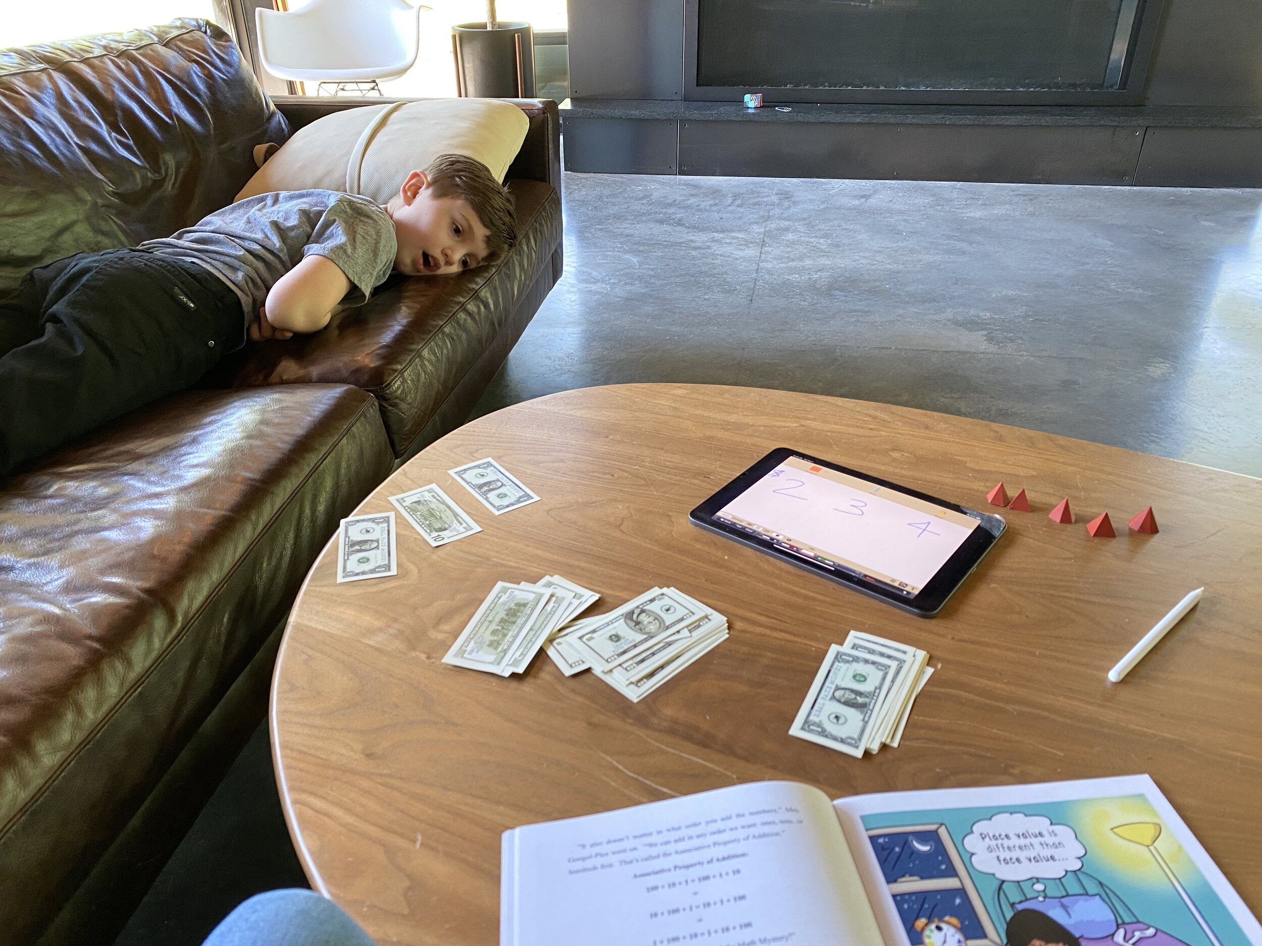 Approach: A high quality fiction story about place value with hands on money for manipulative to follow along. E has a passion for stories so I felt this could be an entry. He typically absorbs all content that he reads. Result: “I am just sooooo tired” and “This is boring!” He enjoyed the story but did not want to leverage the manipulatives to engage in the content. He does recall the content from the story. The tiredness was anxiety, not a need for rest as immediately after he was running freely outside.
