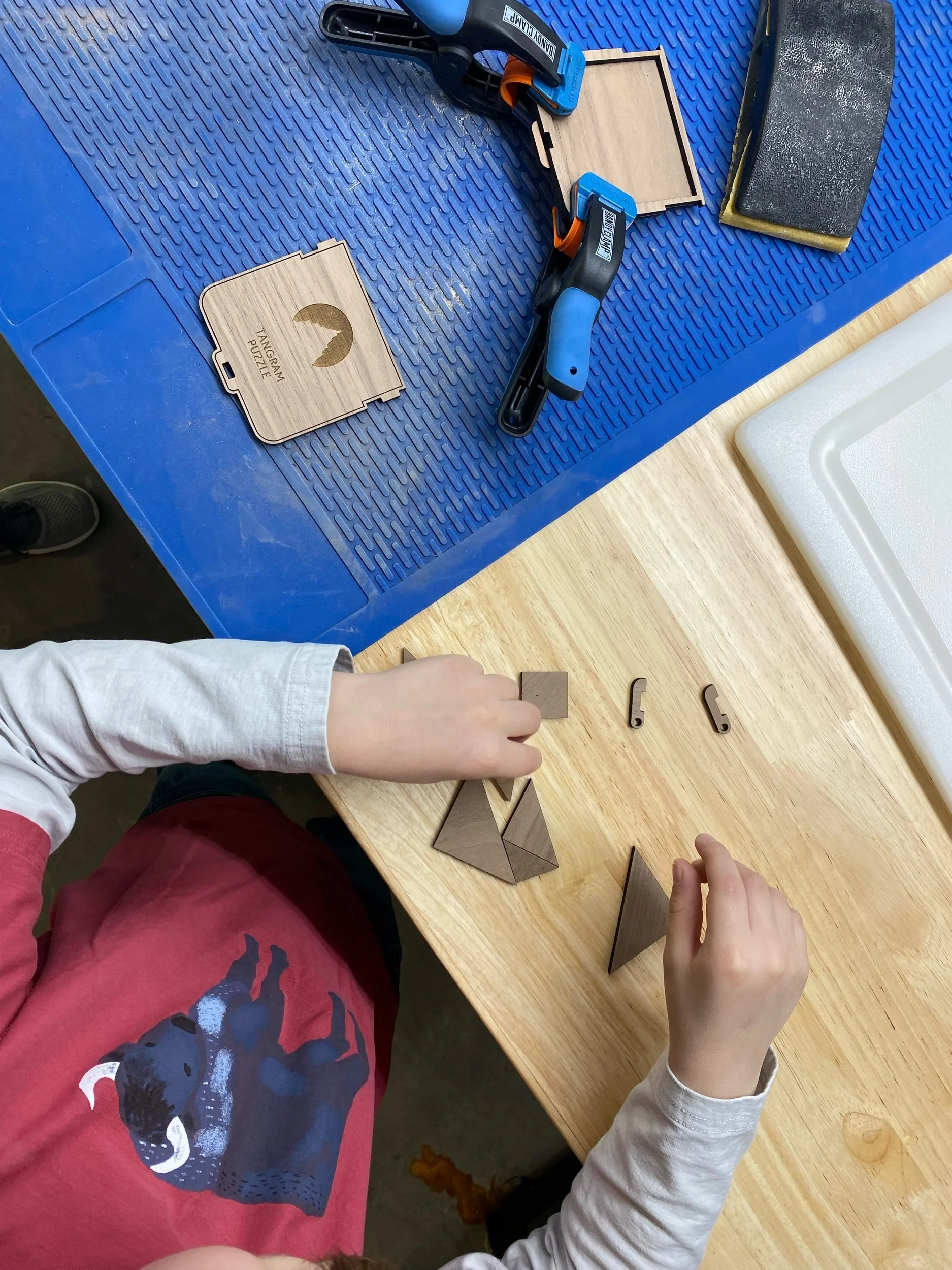 Laser cut tangrams, CRA branded