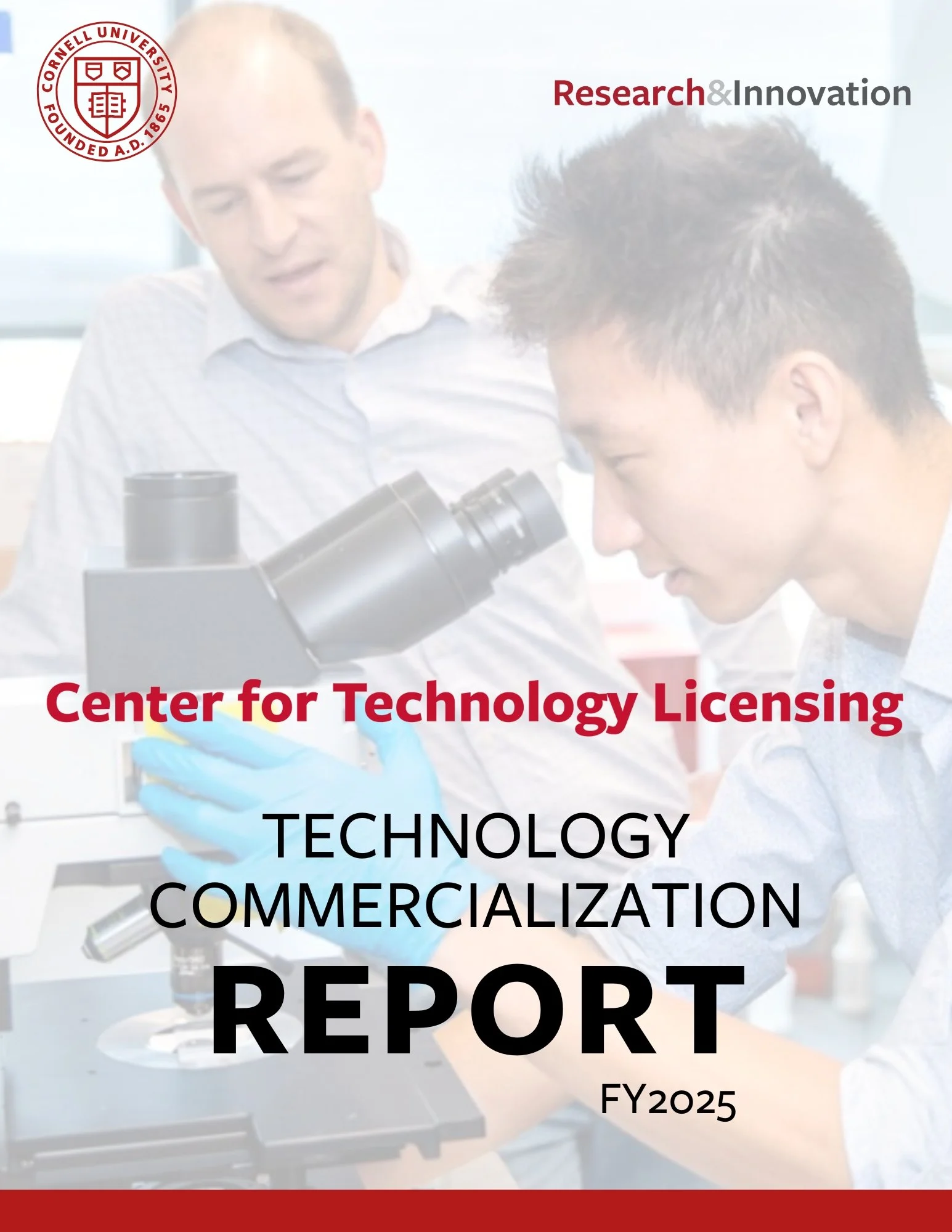 Image of the annual report's cover featuring two Cornell inventors working in a lab.