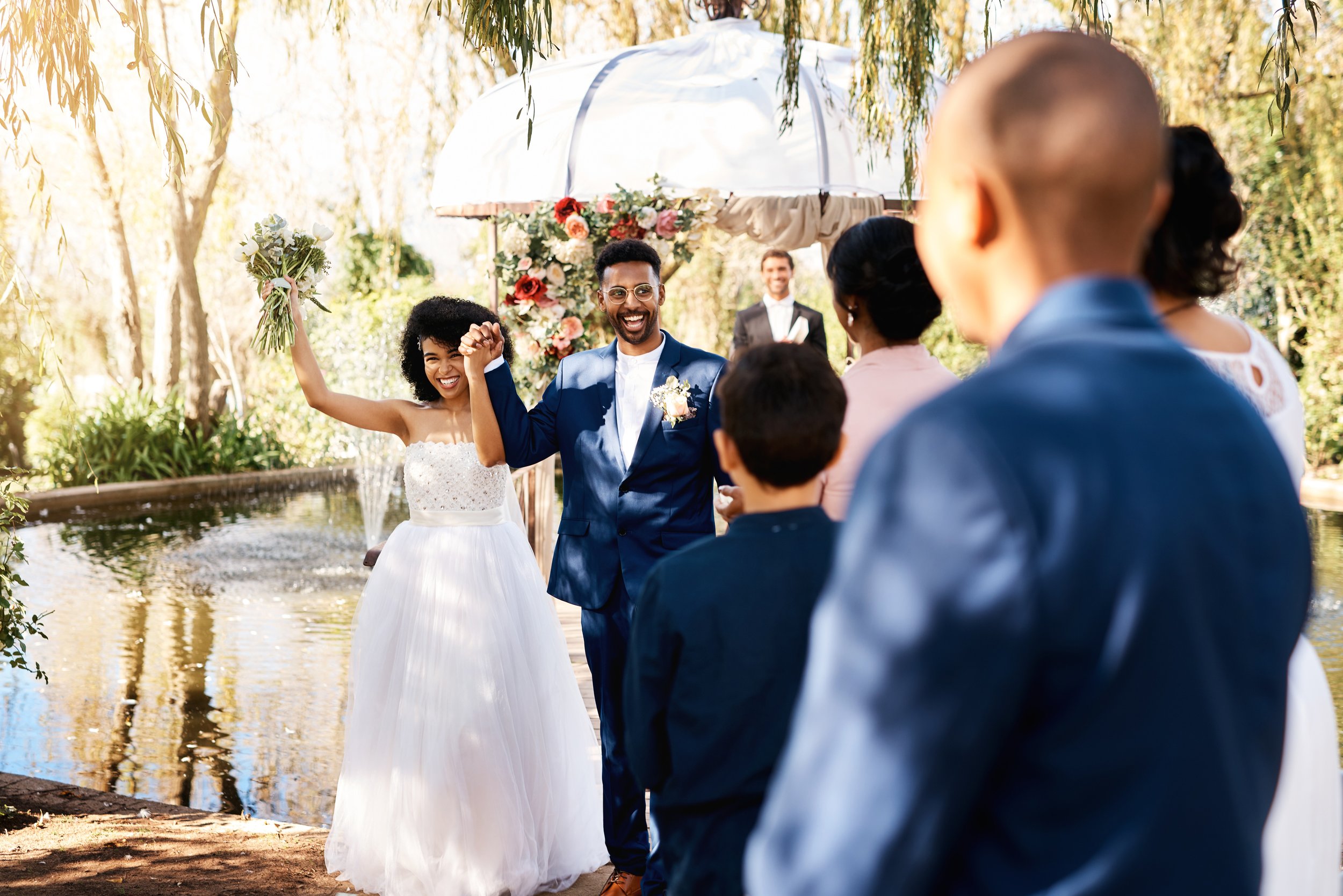 shot-of-a-happy-newlywed-young-couple-walking-down-2023-11-27-05-36-48-utc.jpg