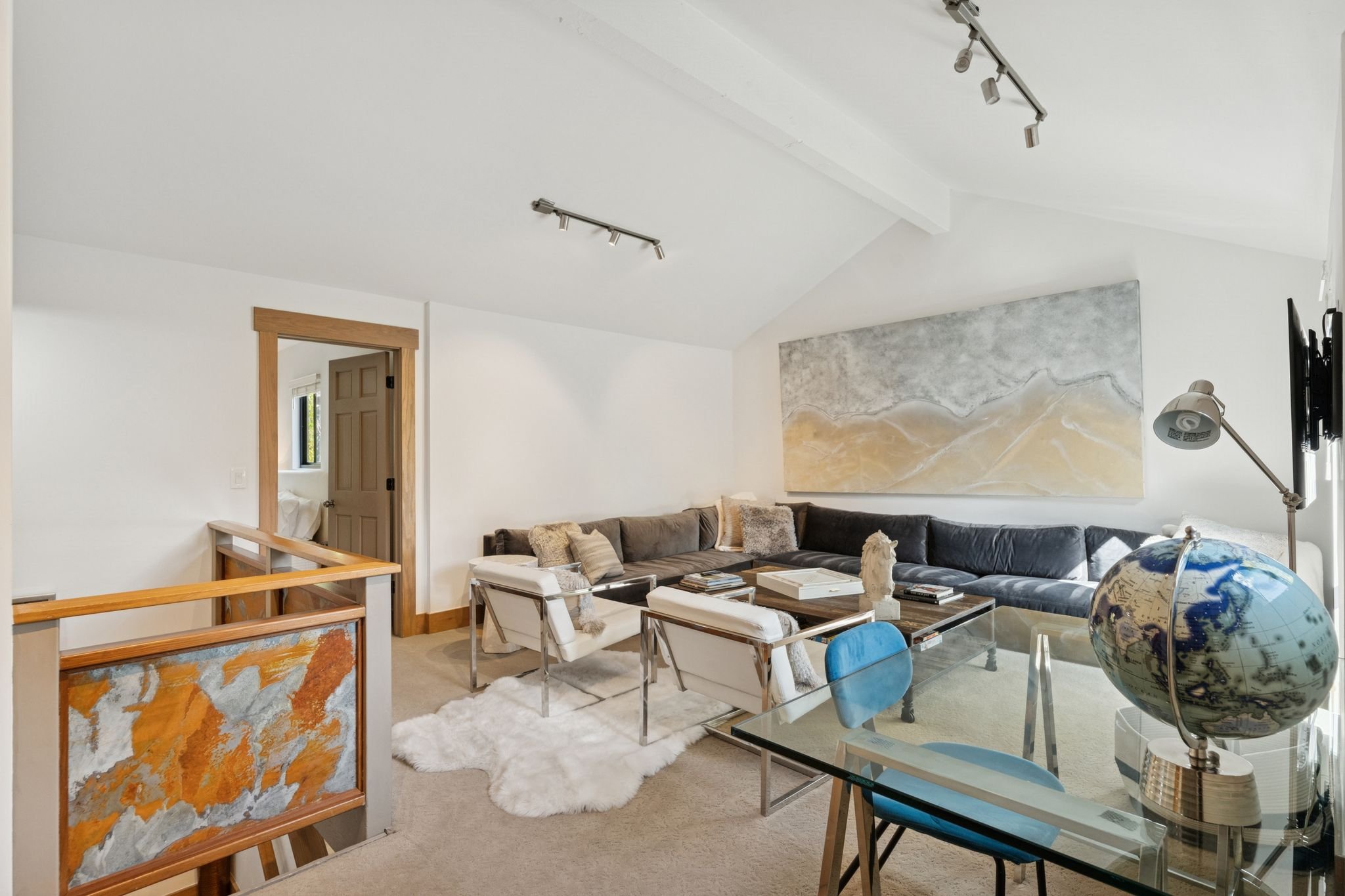 Upper Level Family Room with Work Space,  Games, 65” TV Cable, Prime and Netflix Streaming Services.