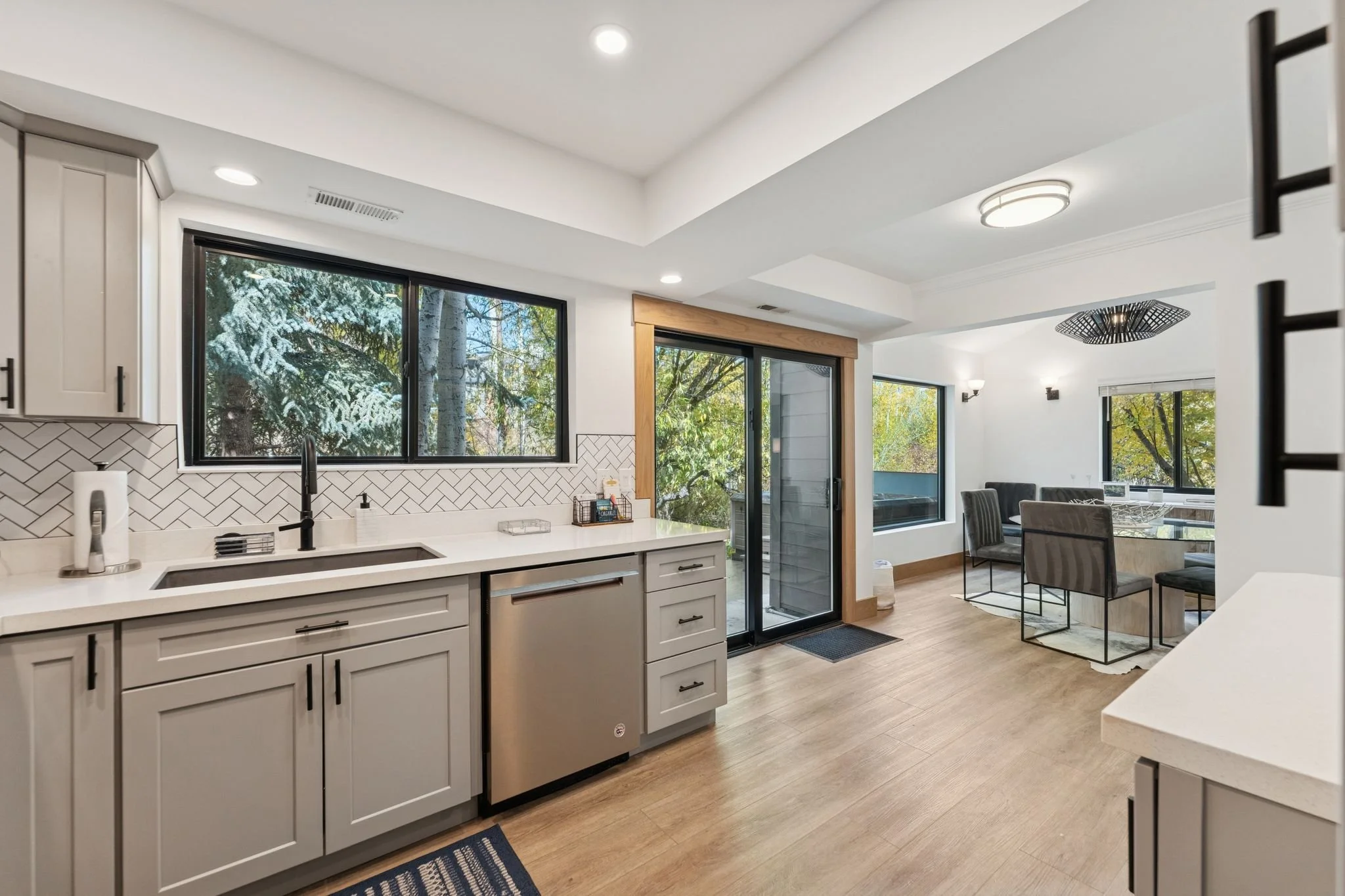 Fully stocked kitchen, oven, stove, refrigerator, freezer, ice maker, coffee machine, blender, serving dishes, and more. 