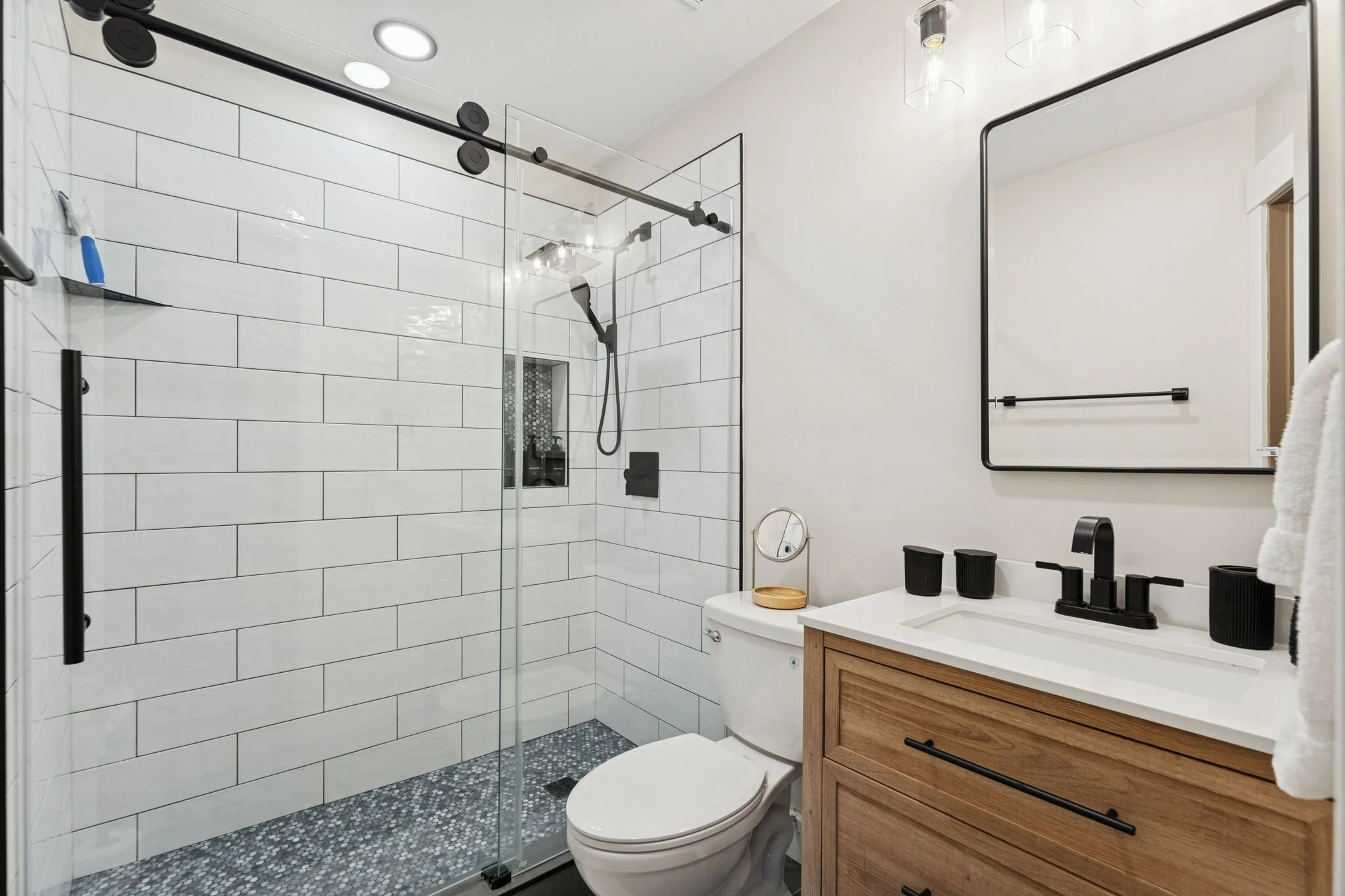 Primary bedroom, newly renovated en-suite bathroom with shower.