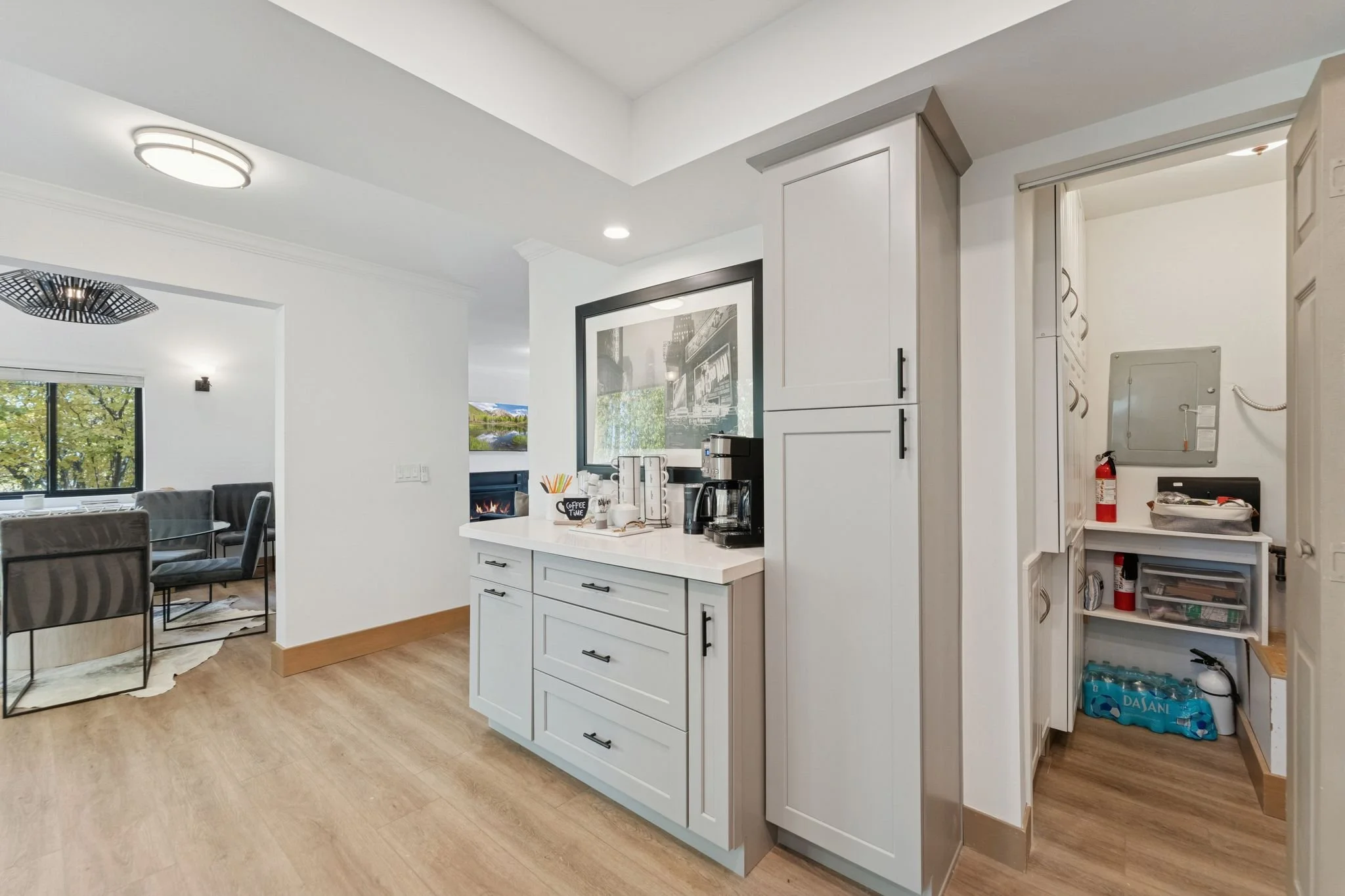 Fully stocked kitchen, oven, stove, refrigerator, freezer, ice maker, coffee machine, blender, serving dishes, and more.