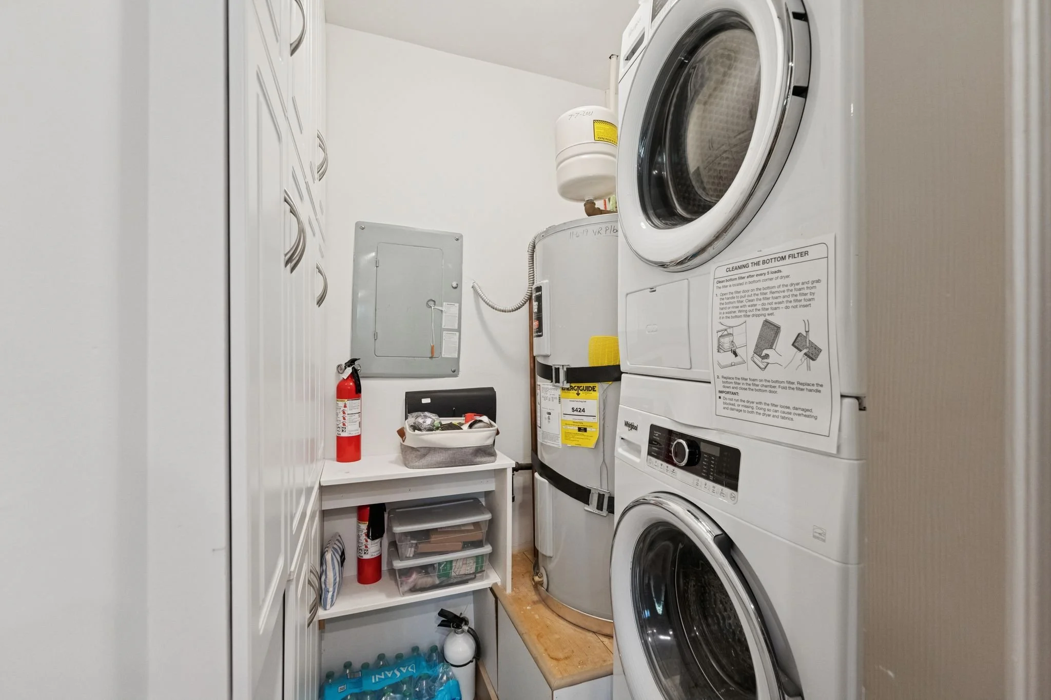 Pantry and laundry. Stackable washer and dryer. Starter laundry supplies. Steamer, iron available. Office and basic home supplies available in baskets (tape, batteries, tools, storage bags, glue, etc.).