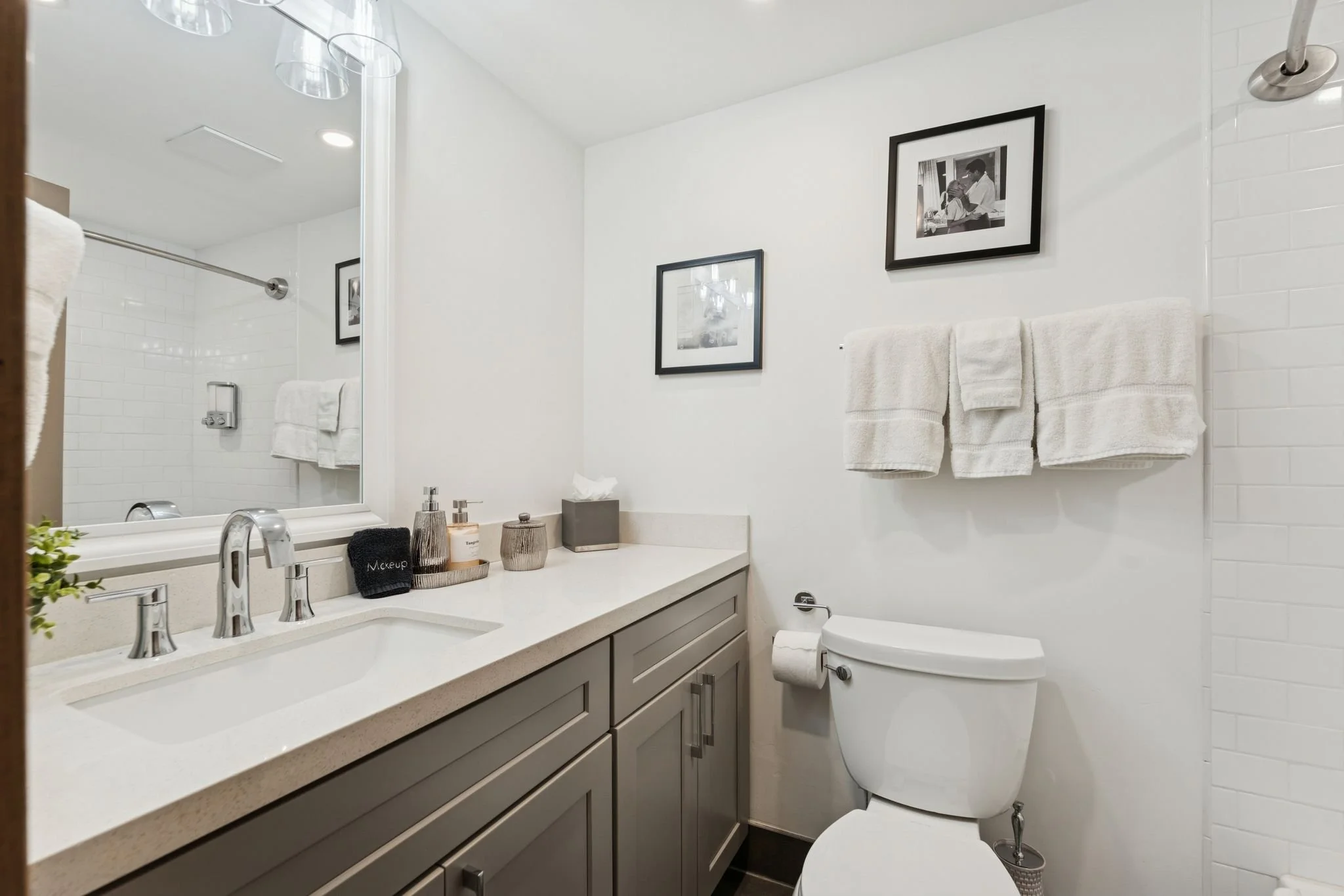 Newly renovated downstairs full bathroom with bathtub.