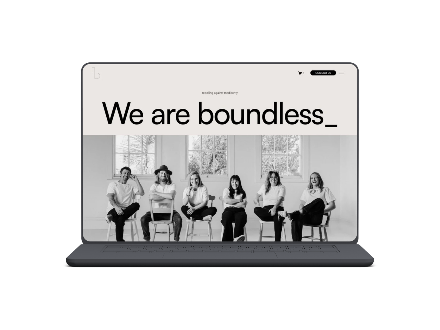 Laptop mockup of a minimal Squarespace website design for a photography agency based in New Zealand.