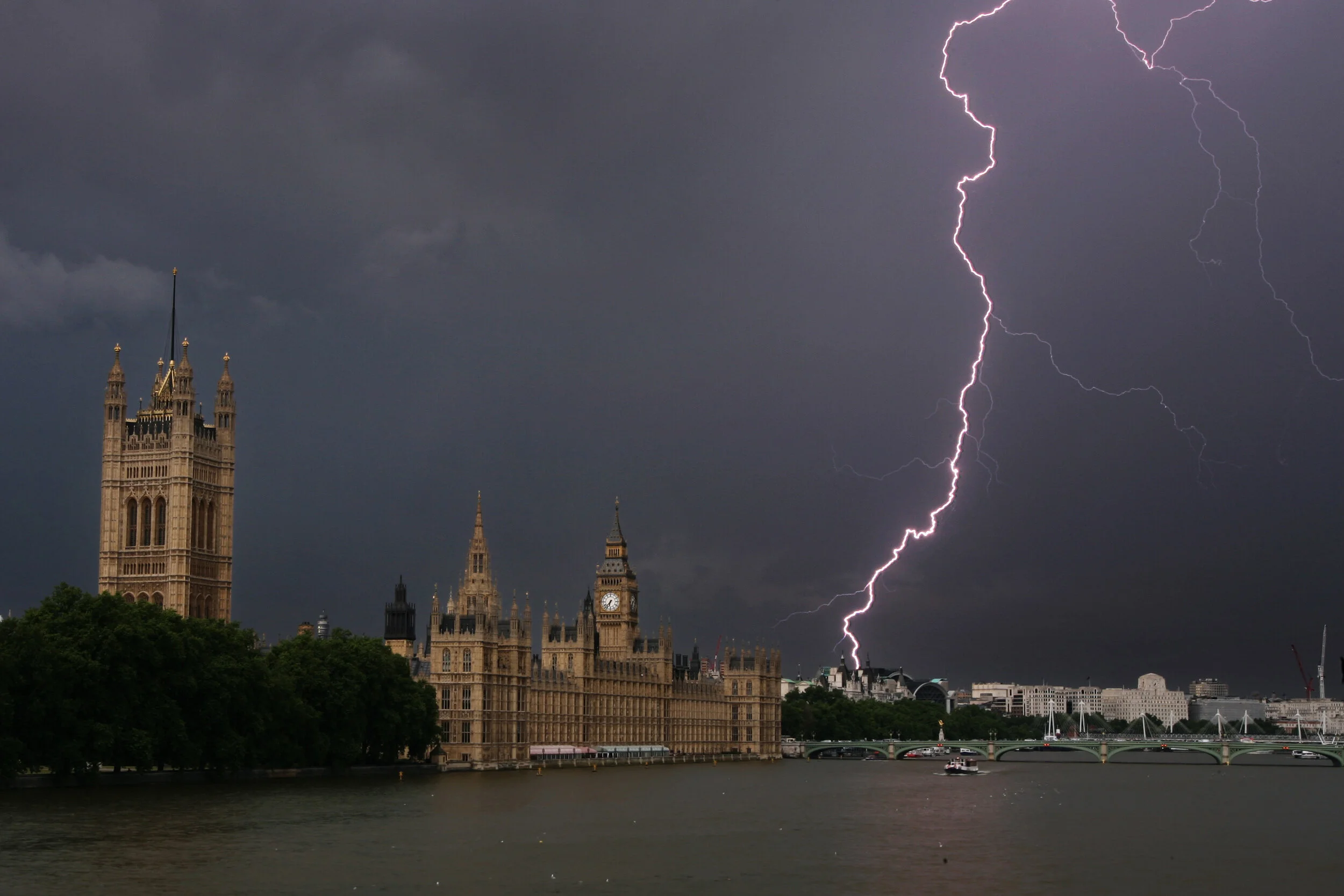 Iconic photograph by Lewis Whyld of a lightning strike next to the Houses of Parliament and Big Ben in London.